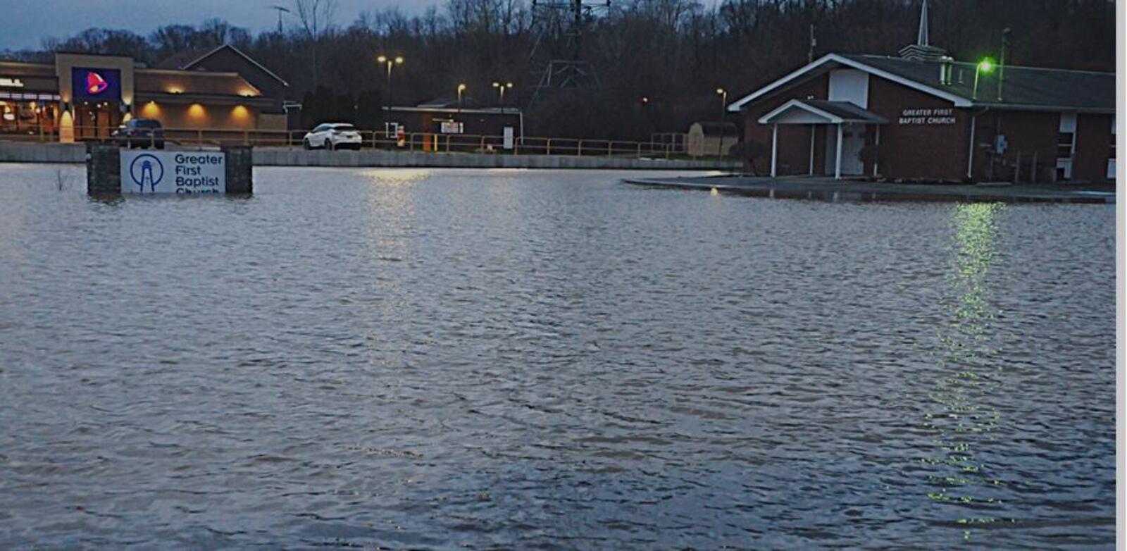 Rising water is shown near Upper Valley Pike near Ohio 41. Marshall Gorby/ STAFF PHOTO