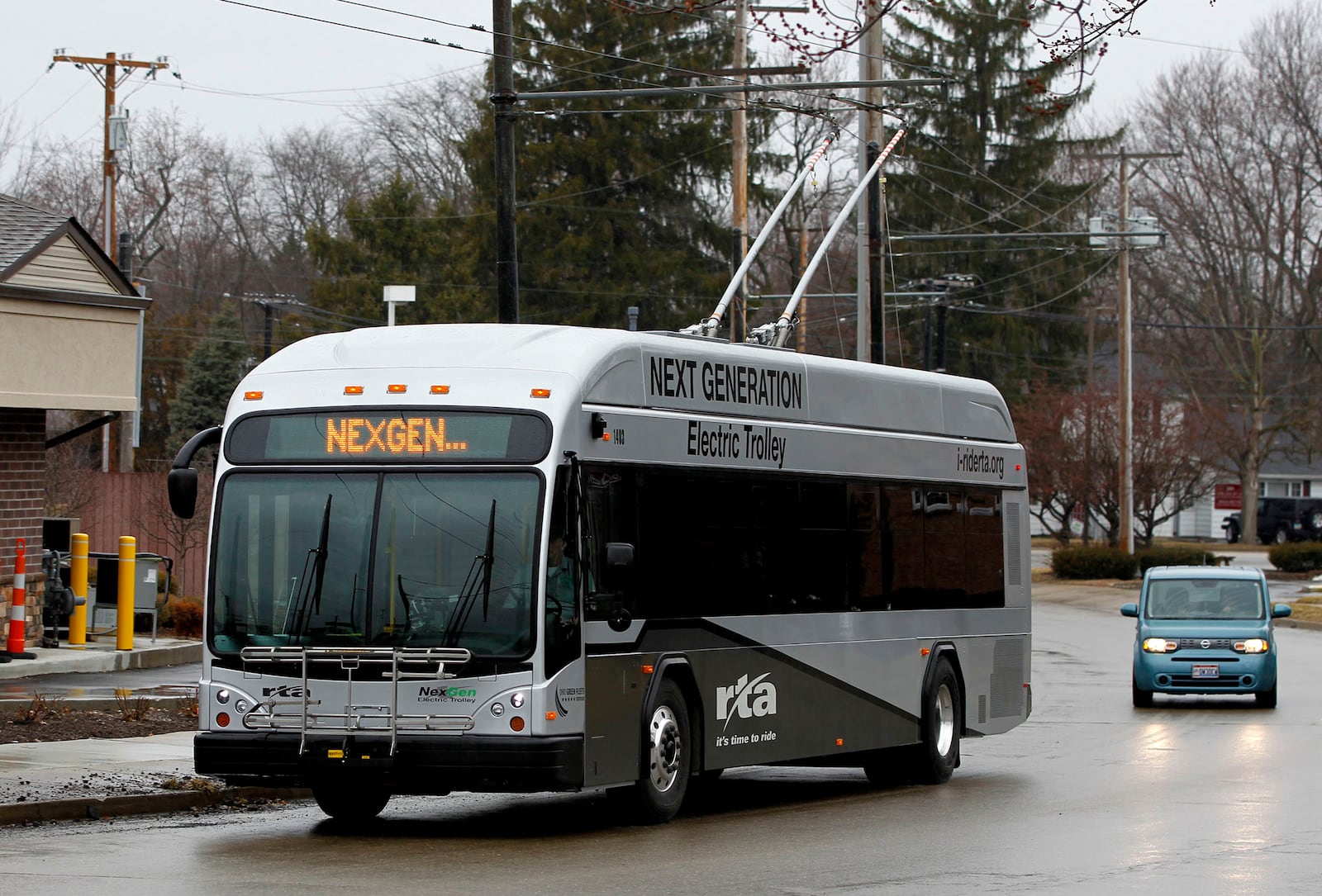 The NexGen electric trolley reaches the end of the route 5 trolley line on Southmoor Circle in Kettering. LISA POWELL / STAFF