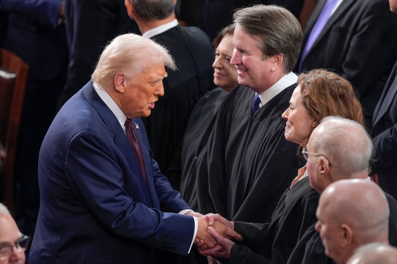 President Donald Trump greets justices of the Supreme Court, from left, Elena Kagan, Bret Kavanaugh, and Amy Coney Barrett, before addressing a joint session of Congress, at the Capitol in Washington, Tuesday, March 4, 2025. (AP Photo/J. Scott Applewhite, File)