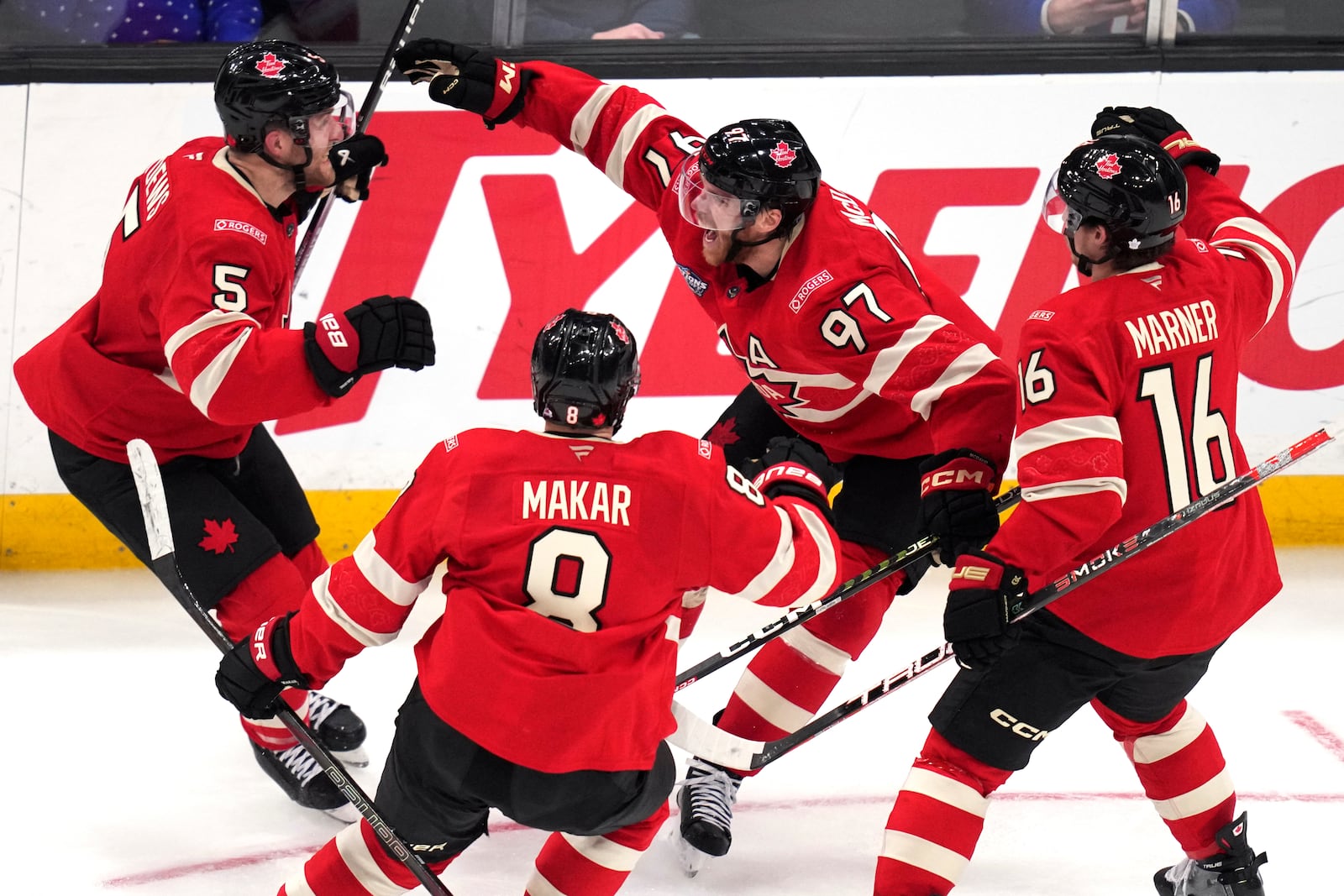 Canada's Connor McDavid (97) celebrates after his winning goal against the United States during an overtime period of the 4 Nations Face-Off championship hockey game, Thursday, Feb. 20, 2025, in Boston. (AP Photo/Charles Krupa)