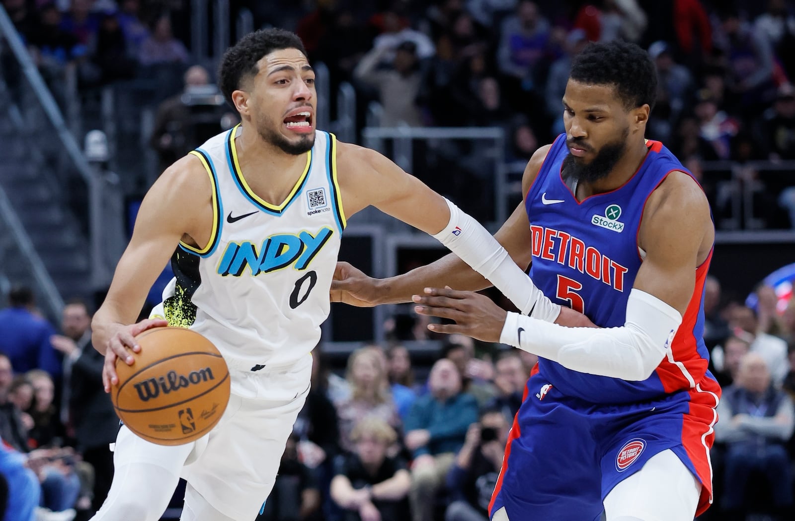 Indiana Pacers guard Tyrese Haliburton (0) drives against Detroit Pistons guard Malik Beasley (5) during the second half of an NBA basketball game Thursday, Jan. 16, 2025, in Detroit. (AP Photo/Duane Burleson)