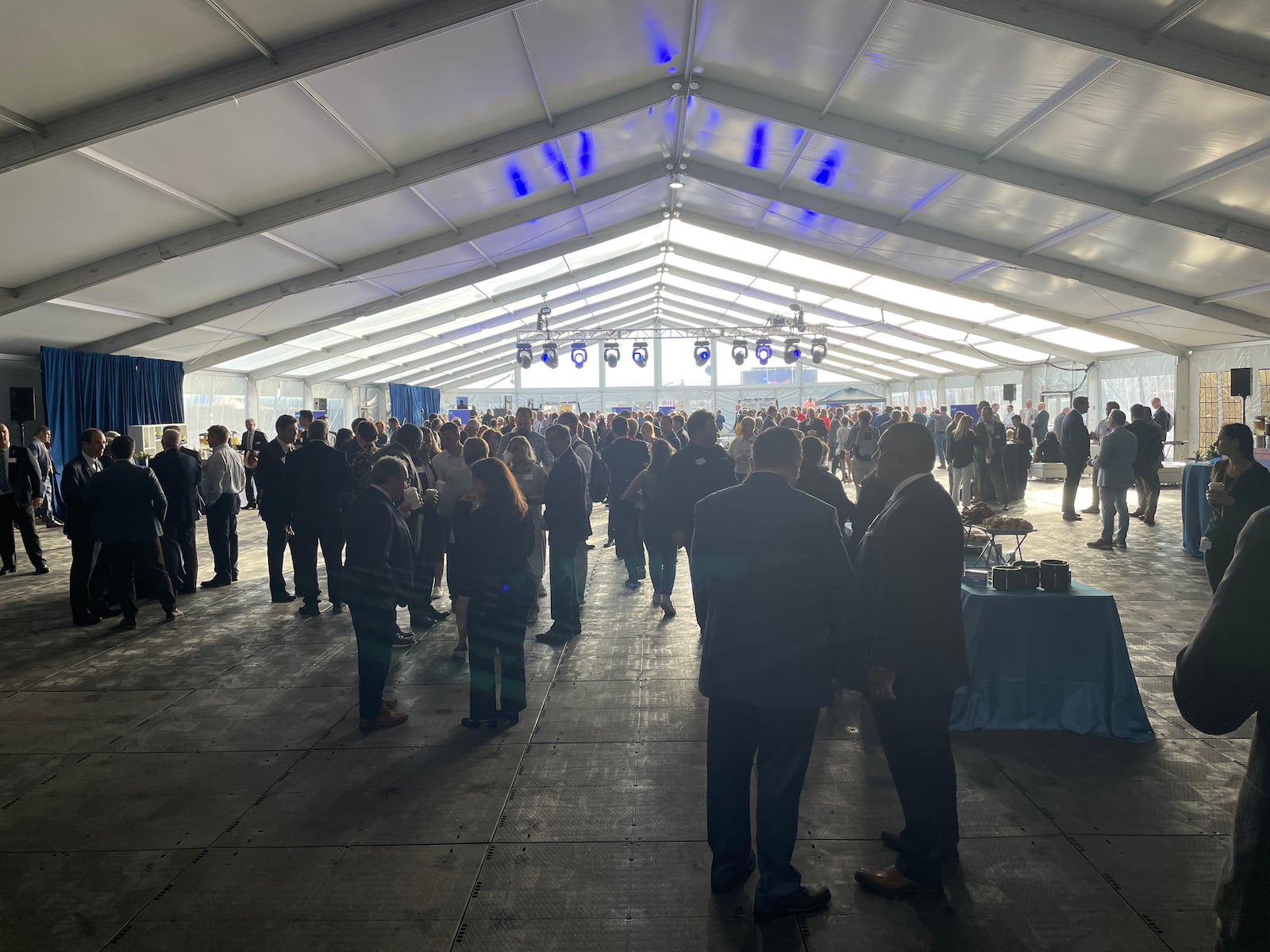 Government, business and educational leaders file through the welcome tent on the site of Intel's planned computer chip factories in New Albany on Sept. 9, 2022.