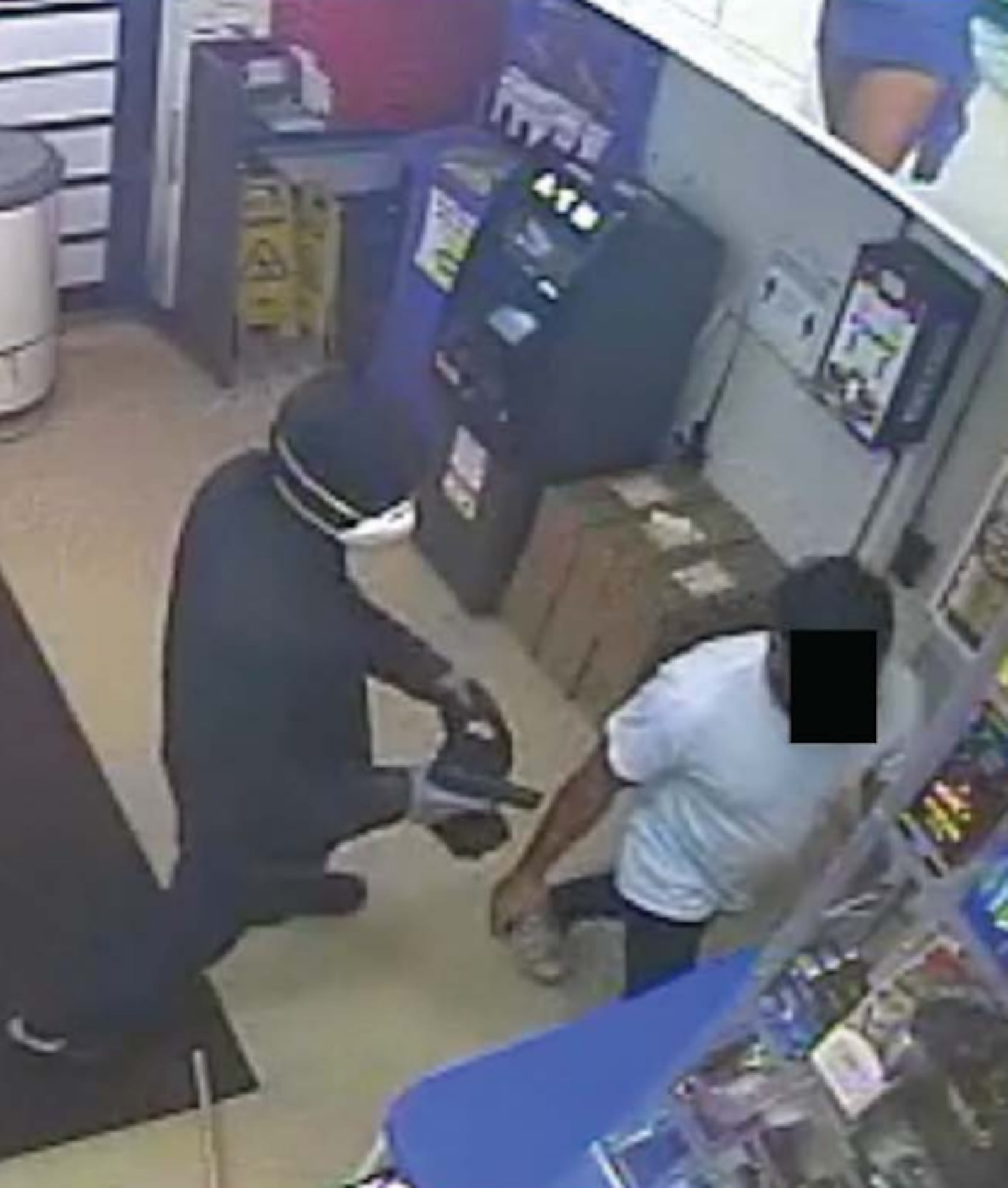 Surveillance cameras captured an armed robbery at the Mini Mart on North Main Street in Dayton on Dec. 10, 2024. Photo courtesy U.S. Southern District of Ohio.