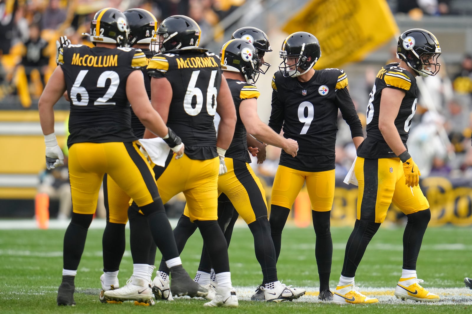 Pittsburgh Steelers kicker Chris Boswell (9) is congratulated by teammates after kicking a field goal against the Baltimore Ravens during the second half of an NFL football game, Sunday, Nov. 17, 2024, in Pittsburgh. (AP Photo/Gene J. Puskar)