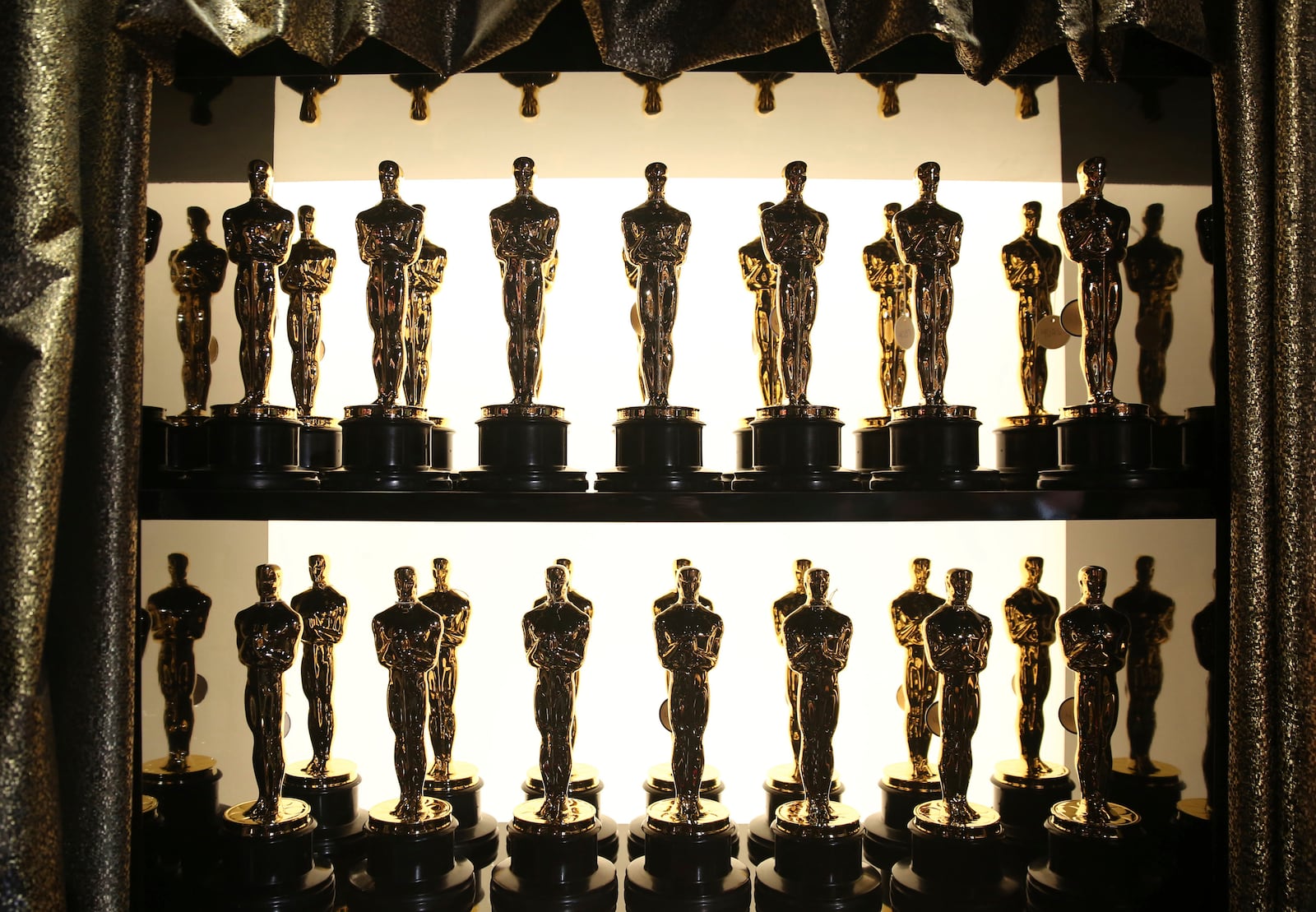 FILE - Oscar statuettes appear backstage at the Oscars at the Dolby Theatre in Los Angeles on Feb. 28, 2016. (Photo by Matt Sayles/Invision/AP, File)