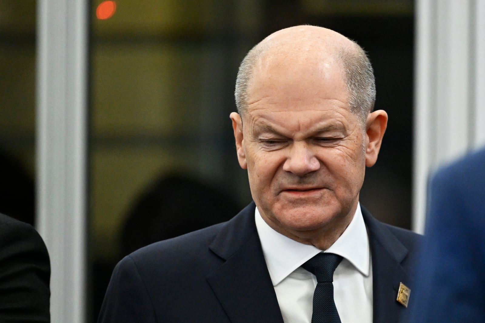 Germany's Chancellor Olaf Scholz arrives for a plenary session during an EU Summit at the Puskas Arena in Budapest, Friday, Nov. 8, 2024. (AP Photo/Denes Erdos)