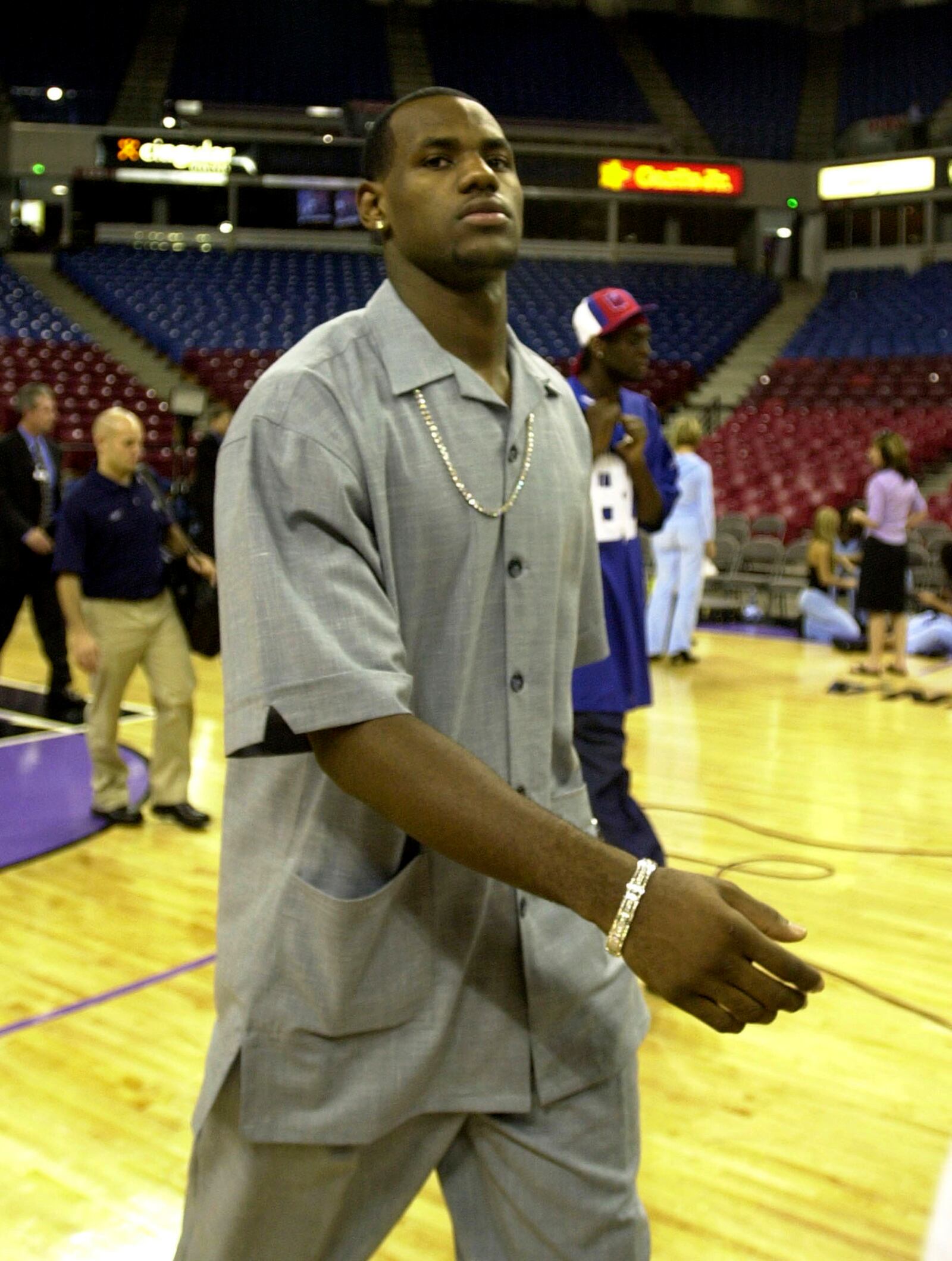 FILE - Cleveland Cavaliers rookie LeBron James walks across the court at Arco Arena after arriving with the team in Sacramento, Calif., on Oct. 29, 2003. (AP Photo/Rich Pedroncelli, File)