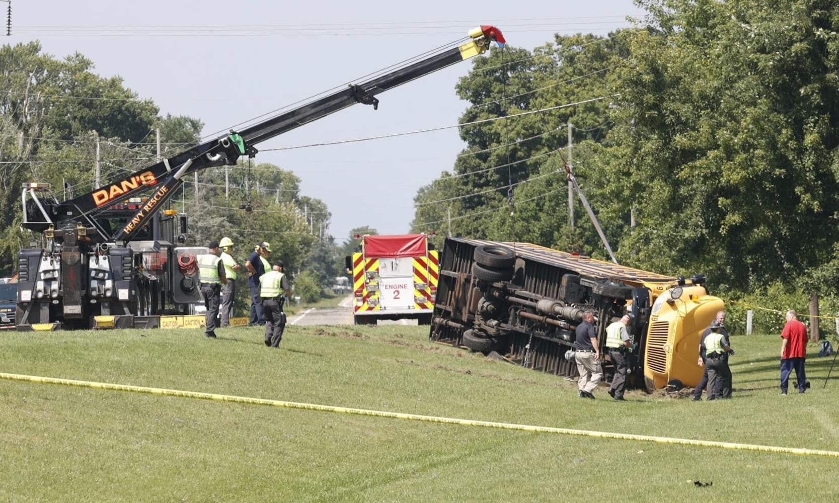 One killed after Northwestern school bus overturns in crash