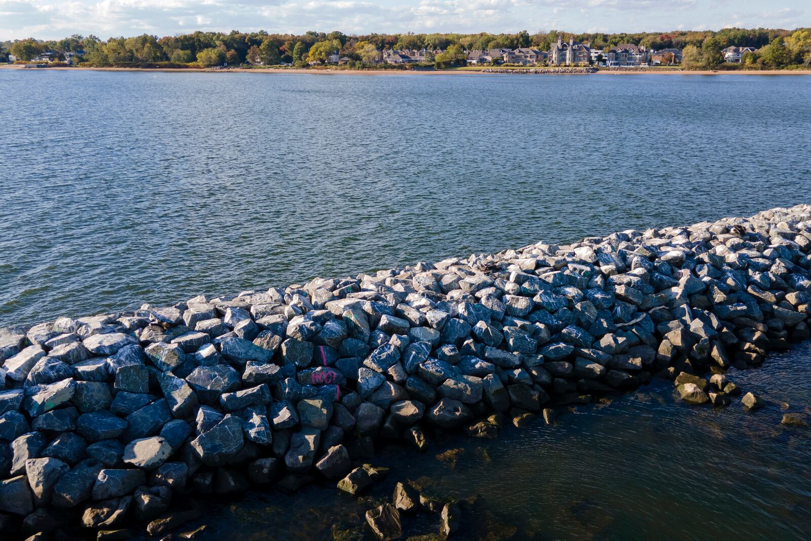 Construction is wrapping up on eight, eco-friendly "Living Breakwaters" at the southernmost tip of New York City, off the coast of Staten Island, Wednesday, Oct, 9, 2024, where artificial reefs were constructed as part of a strategy to reduce risk from hurricanes after Superstorm Sandy pummeled the region in 2012. (AP Photo/Ted Shaffrey)