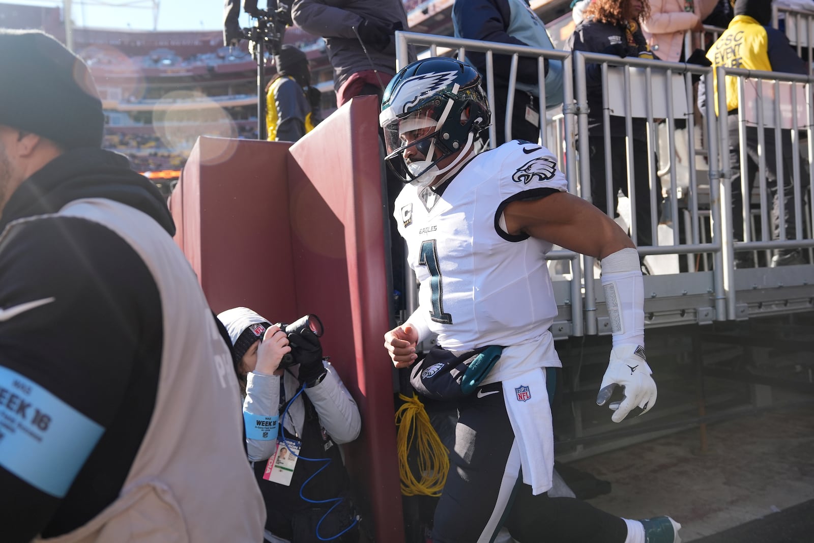 Philadelphia Eagles quarterback Jalen Hurts (1) taking the field before the start of an NFL football game against the Washington Commanders, Sunday, Dec. 22, 2024, in Landover, Md. (AP Photo/Stephanie Scarbrough)