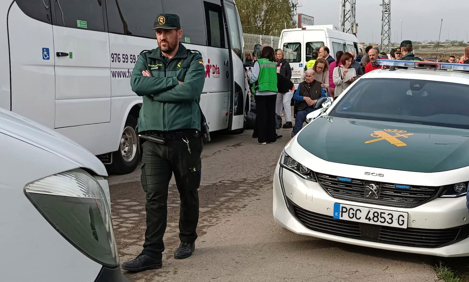 Residents are moved out of the nursing home where least 10 people have died in a fire in Zaragoza, Spain, Friday, Nov. 15, 2024. (AP Photo/Ferran Mallol )