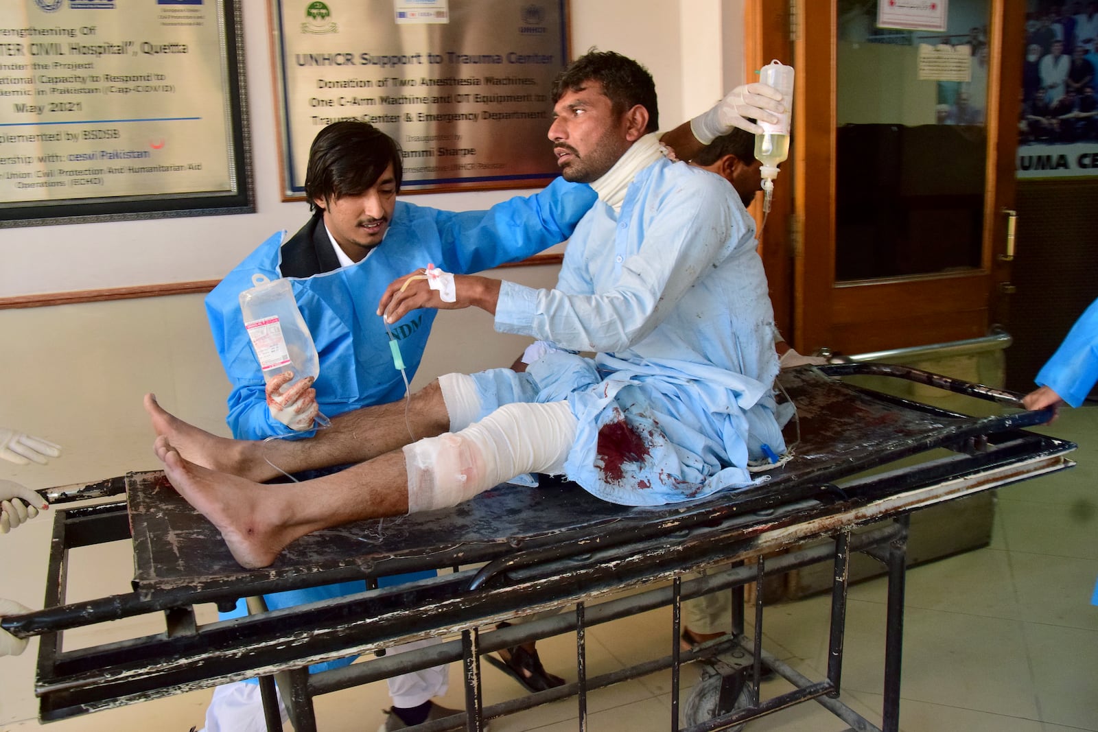 An injured victim of bomb explosion at railway station, is treated at a hospital in Quetta, southwestern Pakistan, Saturday, Nov. 9, 2024. (AP Photo/Arshad Butt)