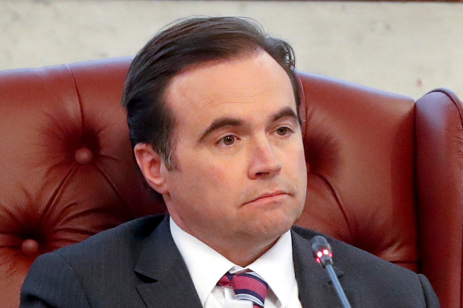 FILE - In this March 21, 2018, file photo, former Cincinnati mayor John Cranley listens during a city council meeting in Cincinnati. Cranley is facing former Dayton mayor Nan Whaley in the Democratic Party Ohio primary as they both run for governor. Some high-profile Democrats in Ohio are urging party leaders to remain neutral in that competitive primary as the party works to support a pick that can lead its ticket to long-sought wins this fall. (AP Photo/John Minchillo, File)