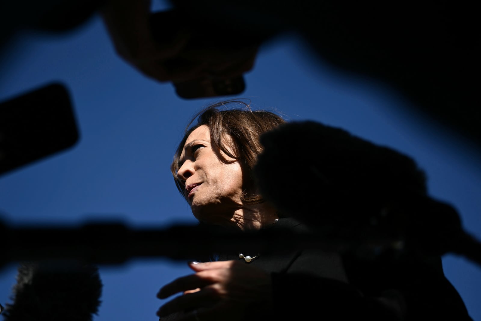 Democratic presidential nominee Vice President Kamala Harris talks to reporters before boarding Air Force Two, Wednesday, Oct. 30, 2024, at Joint Base Andrews, Md. (Brendan Smialowski/Pool via AP)