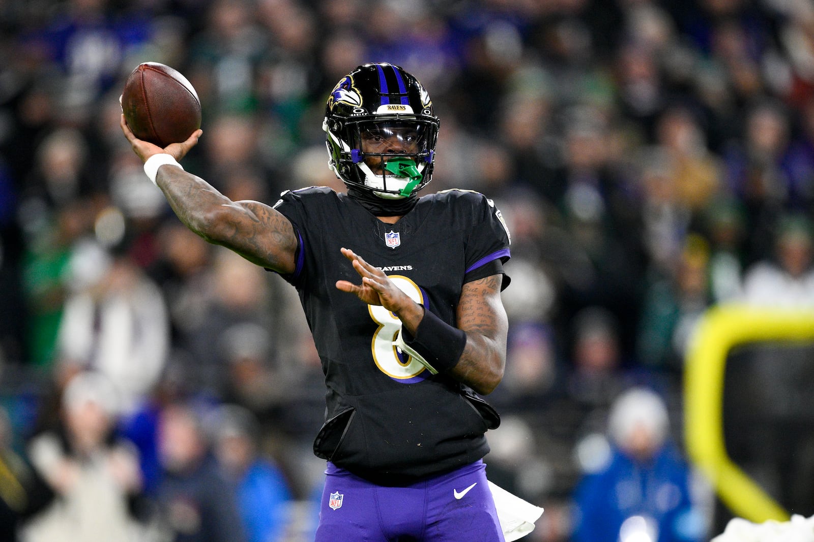 Baltimore Ravens quarterback Lamar Jackson throws a pass against the Philadelphia Eagles during the first half of an NFL football game, Sunday, Dec. 1, 2024, in Baltimore. (AP Photo/Nick Wass)