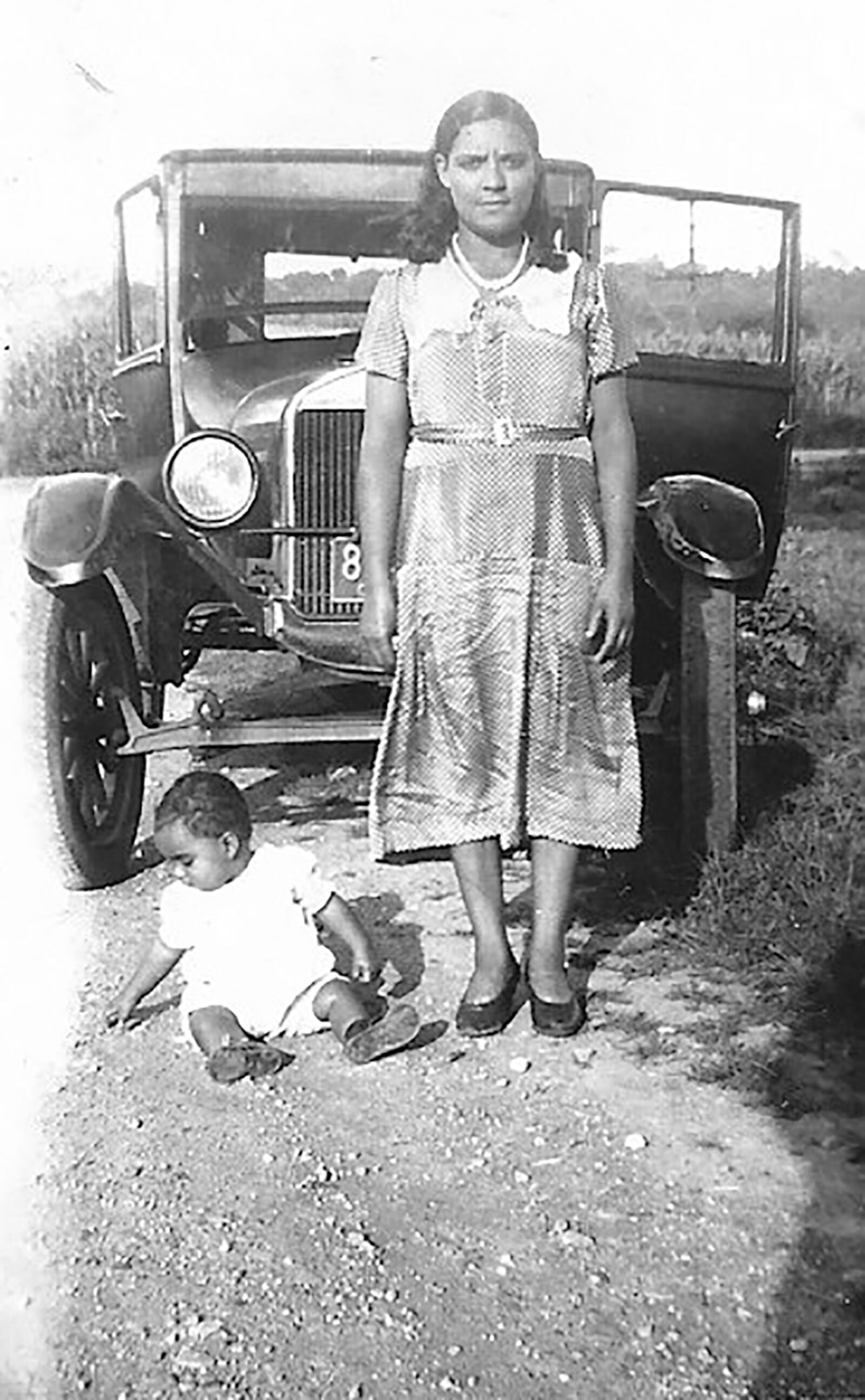 Johnson as a 6 month old with his mother on the family farm in Frankfort, Ohio. As he grew older, one of Johnson's chores was to start the family's Kettering generator each day.