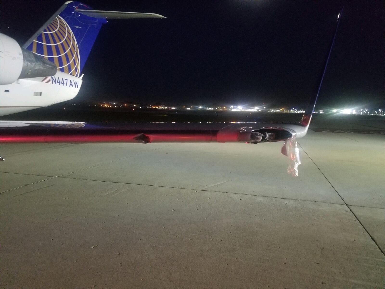 The wing of Air Wisconsin Flight 3818 on Oct. 5, 2022, after the plane veered off the runway at the Dayton International Airport. CONTRIBUTED