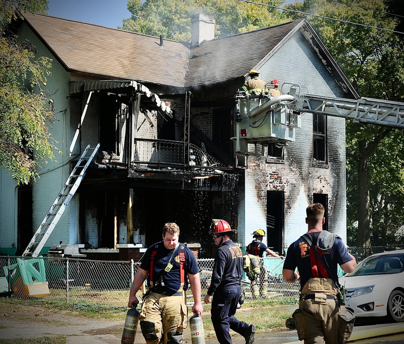 Members of the Springfield Fire Rescue Division battled a house fire in the 400 block of West Pleasant Street on Friday September 22, 2023. MARSHALL GORBY \STAFF