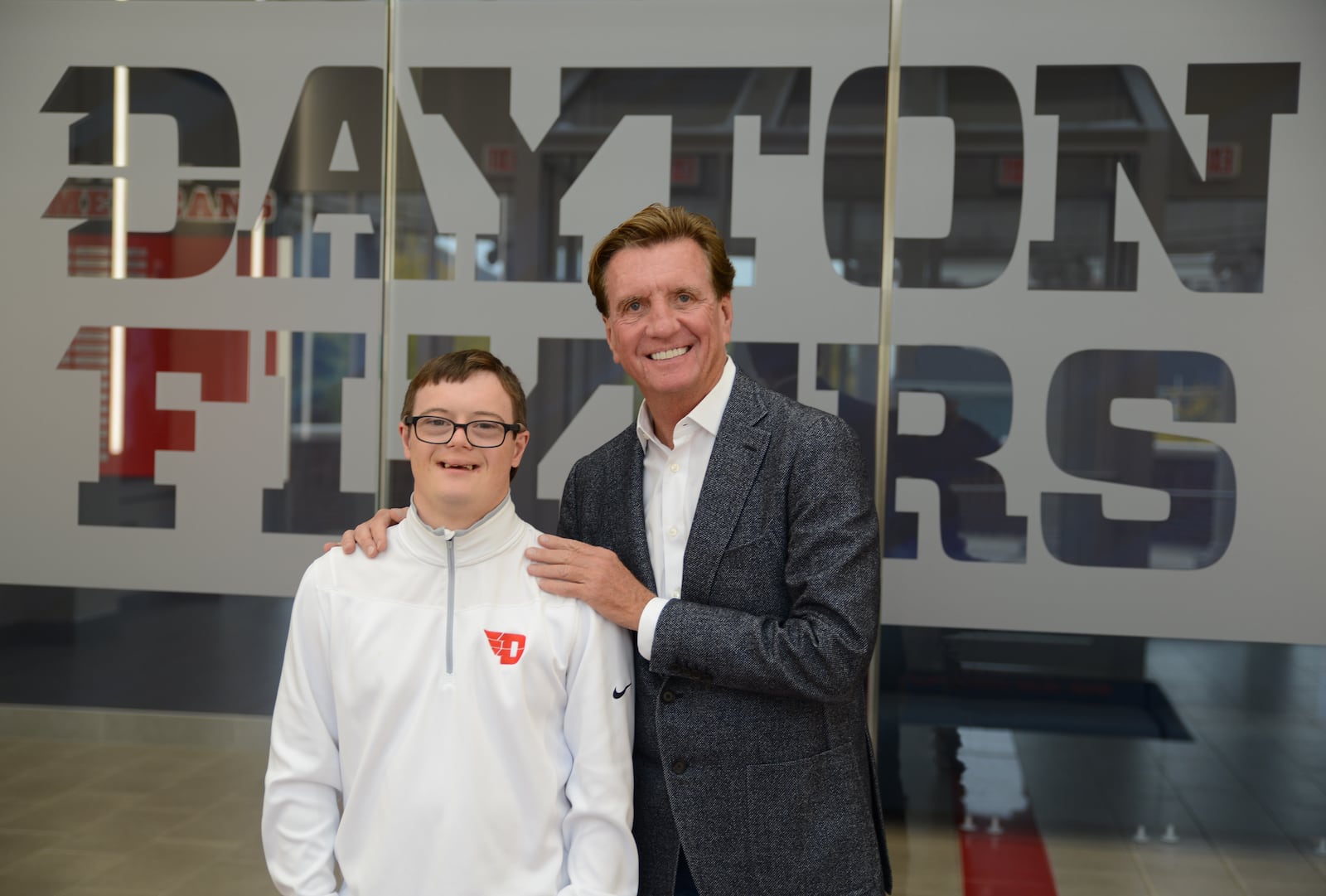 Larry Connor and his son, Colin, the popular UD Flyers basketball fan and his dad's fellow training partner. CONTRIBUTED