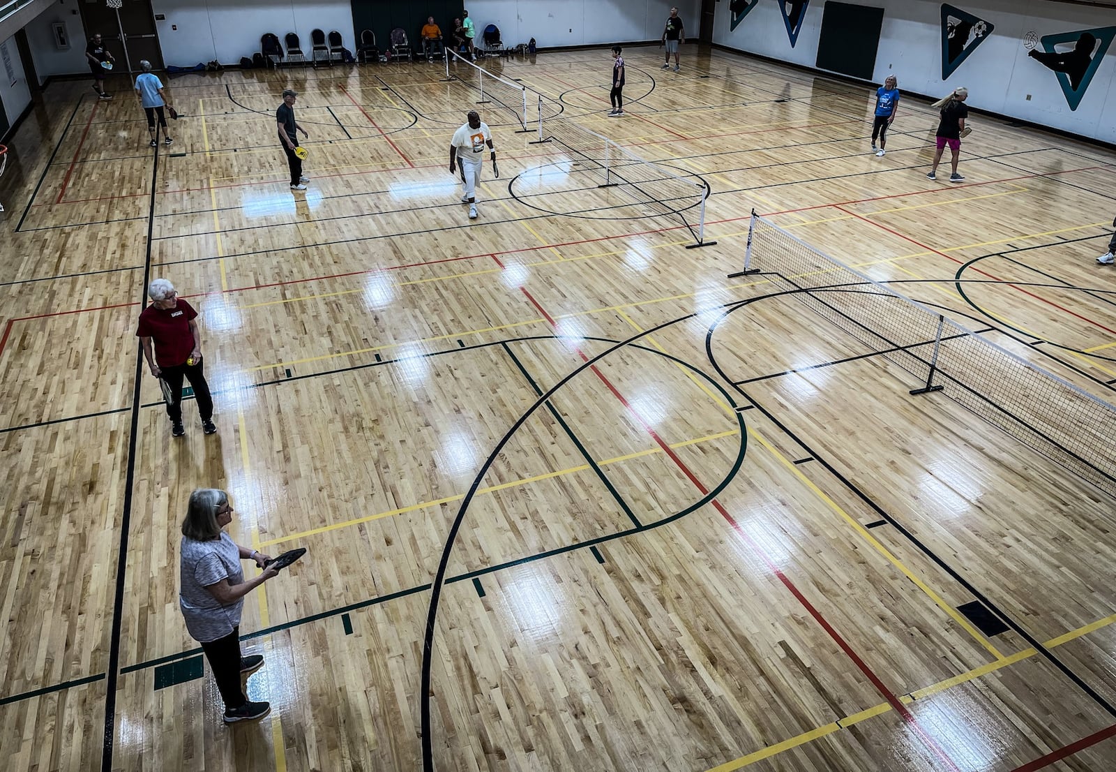 Lots of seniors play pickle ball at the YMCA in Englewood on National Rd. JIM NOELKER/STAFF