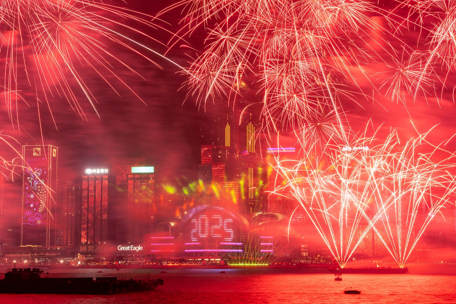 Fireworks explode over Victoria Harbour to celebrate the start of 2025 at Tsim Sha Tsui in Hong Kong, Wednesday, Jan. 1, 2025. (AP Photo/Chan Long Hei)