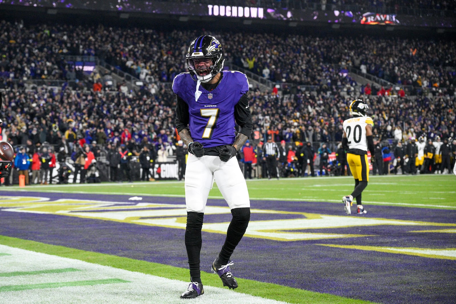 Baltimore Ravens wide receiver Rashod Bateman celebrates after scoring a touchdown against the Pittsburgh Steelers during the first half of an NFL wild-card playoff football game, Saturday, Jan. 11, 2025, in Baltimore. (AP Photo/Nick Wass)