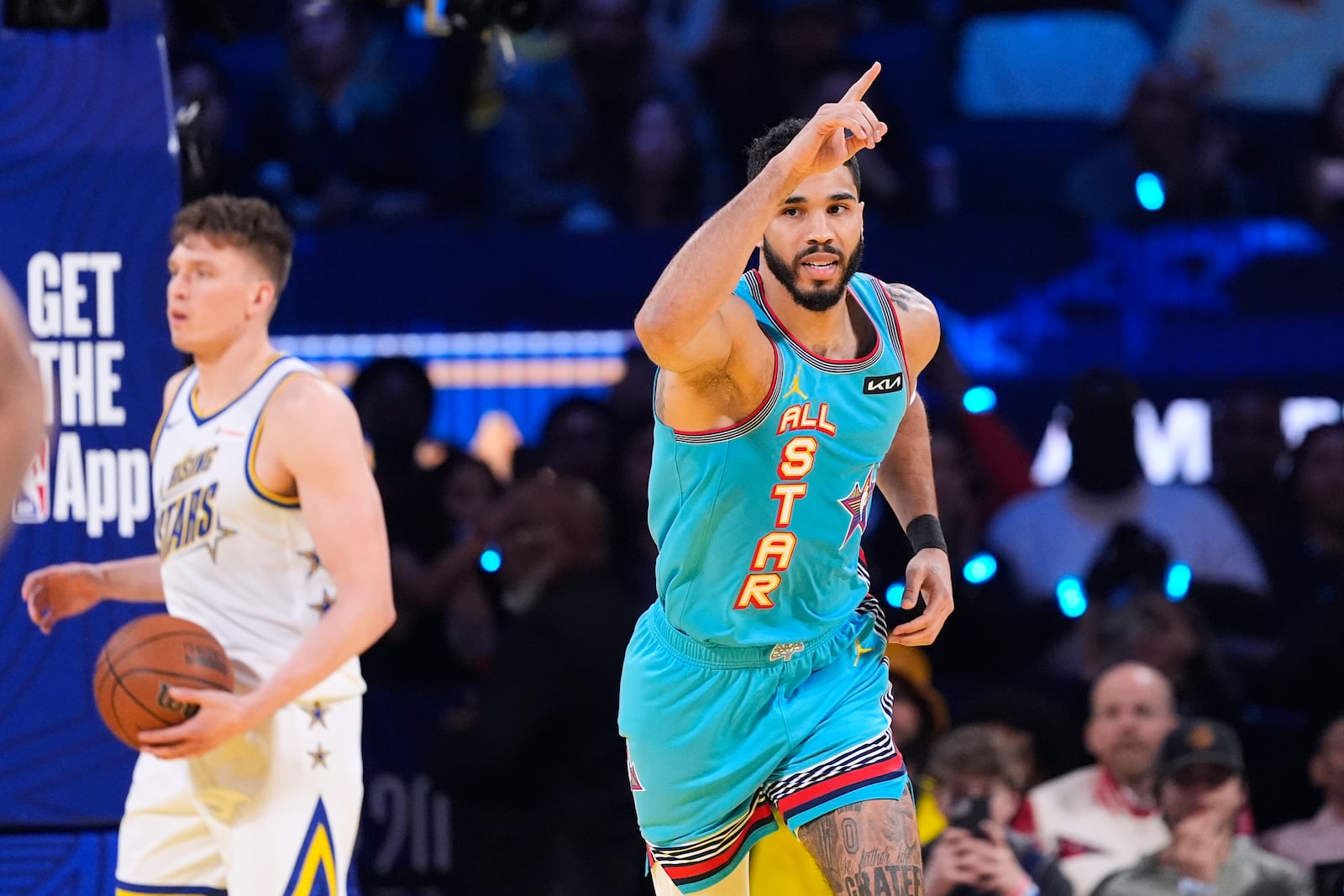 Boston Celtics guard Jayson Tatum reacts after scoring during the NBA All-Star basketball game Sunday, Feb. 16, 2025, in San Francisco. (AP Photo/Godofredo A. Vásquez)