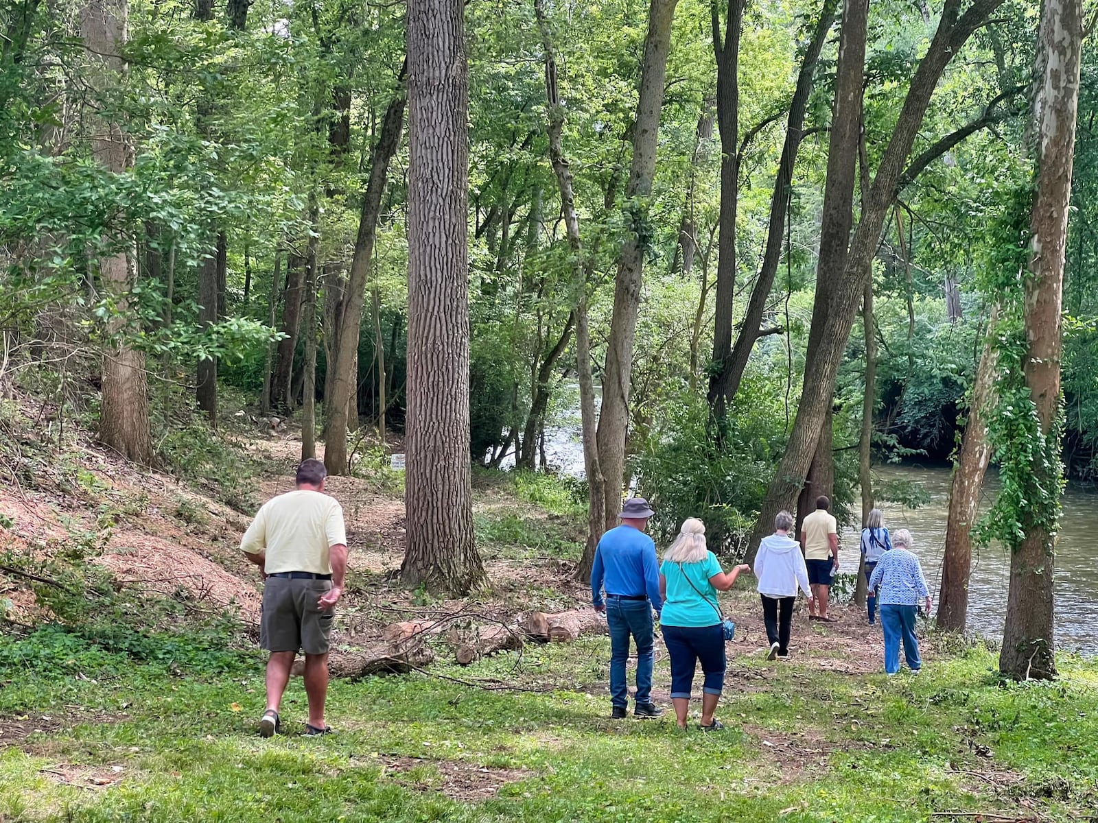 People viewing the Mad River during the dedication for the Riley RiverPlay Reserve. CONTRIBUTED