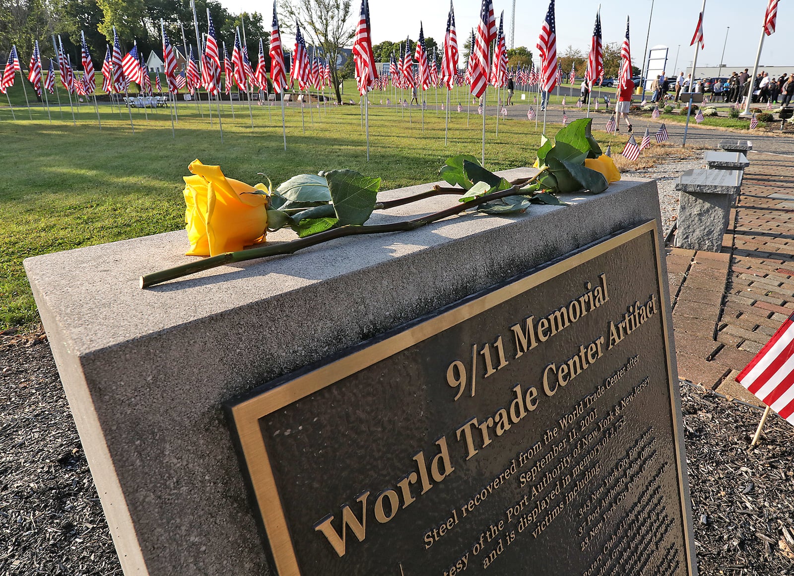 Champaign County held a 9/11 Remembrance Ceremony Saturday, the 20th anniversary of the terrorist attacks on America. The ceremony at Freedom Grove in Urbana, where a piece of the World Trade Center is located, remembered all the victims including Alicia Titus, a Champaign County native who was a flight attendant on the second plane to strike the World Trade Center. To mark the 20th anniversary, a 5k peace run/walk was held in Alicia's name. BILL LACKEY/STAFF