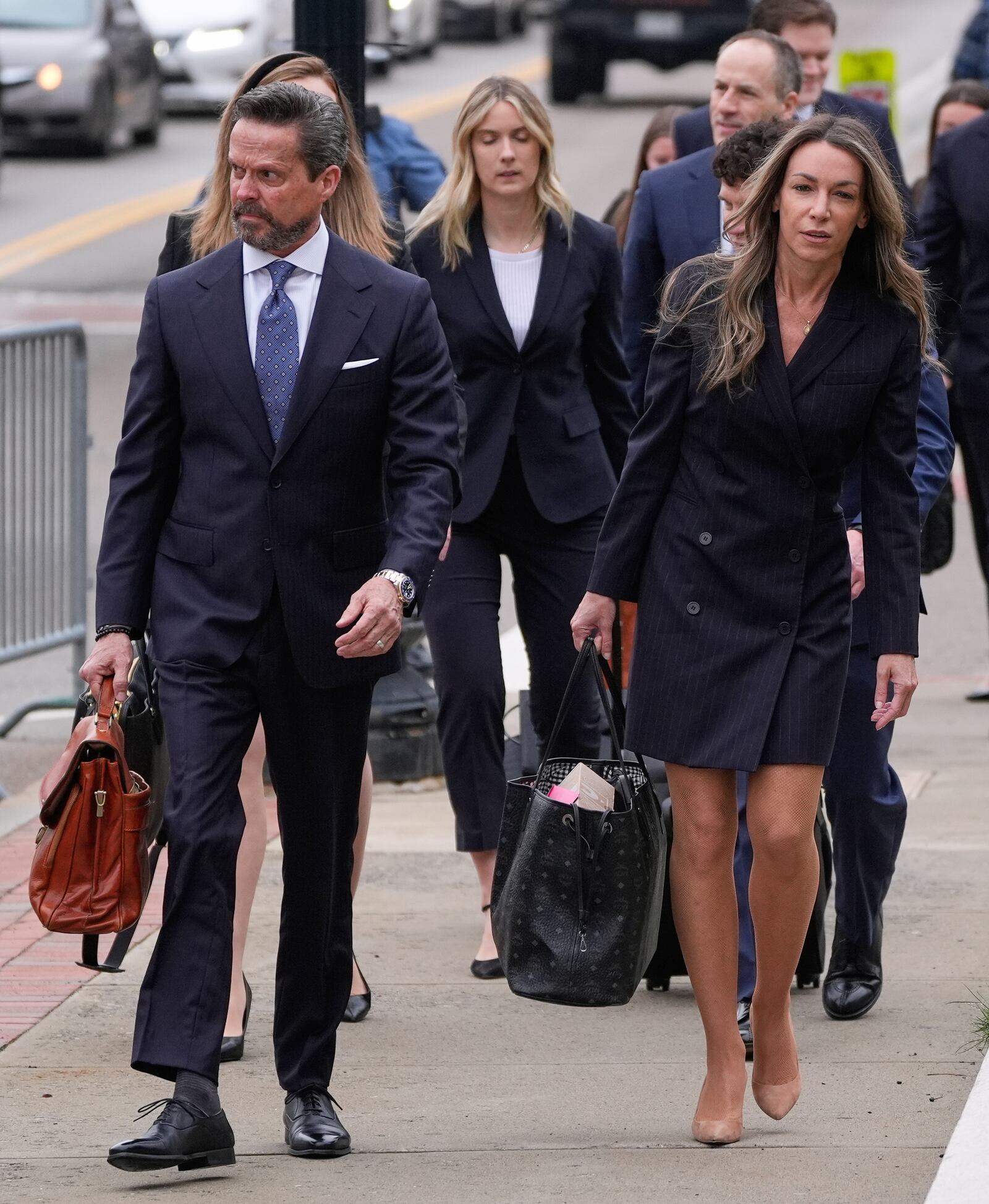 Karen Read arrives with her lead defense attorney Alan Jackson, left, for her trial at Norfolk Superior Court, Tuesday, April 22, 2025, in Dedham, Mass. (AP Photo/Charles Krupa)
