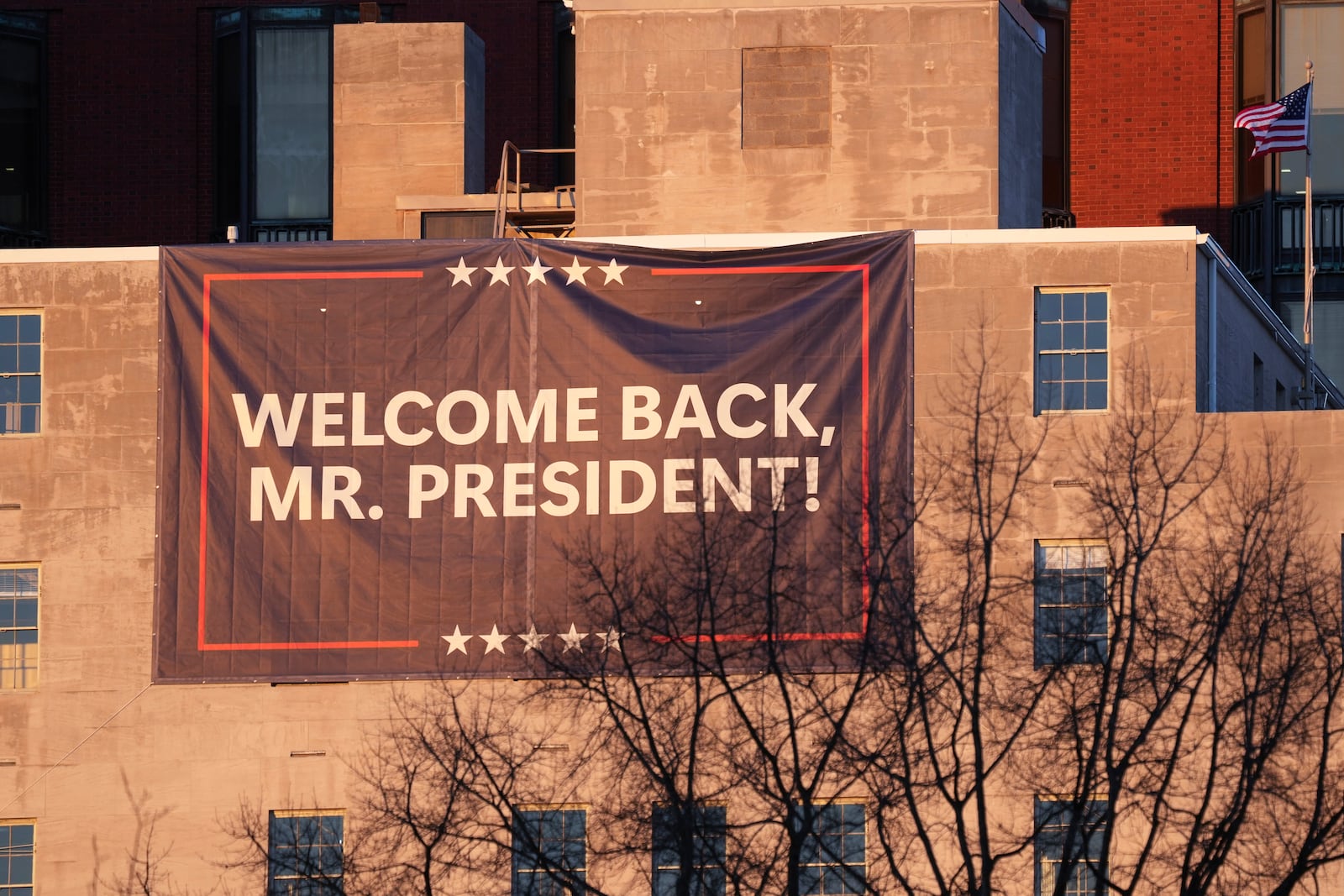 A sign is seen near St. John's Episcopal Church across from the White House in Washington, Monday, Jan. 20, 2025, where President-elect Donald Trump and his wife Melania will attend an early morning service to start Trump's inauguration day. (AP Photo/Matt Rourke)