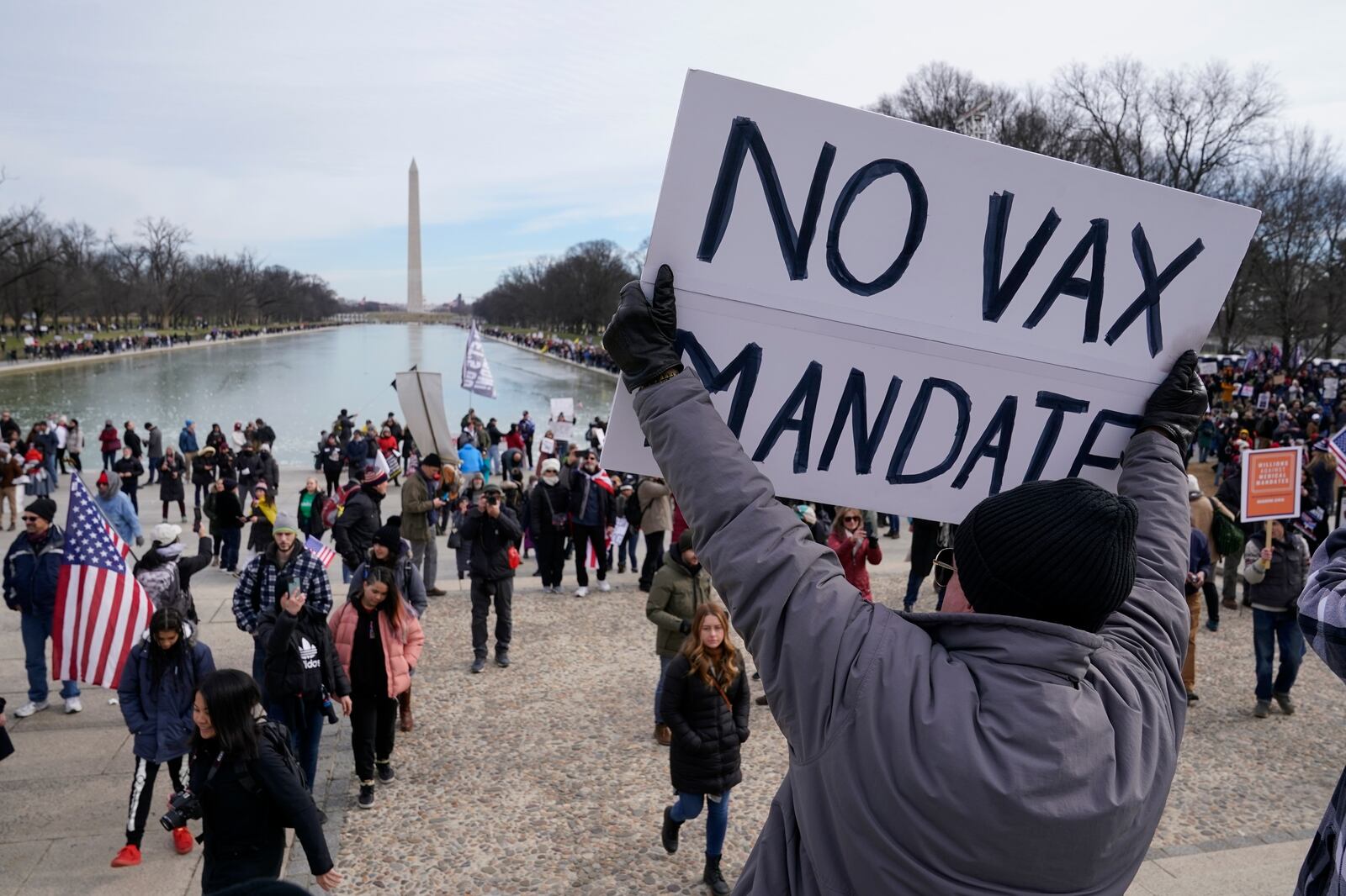 FILE - Protesters gather for a rally against COVID-19 vaccine mandates in front of the Lincoln Memorial in Washington, on Jan. 23, 2022. (AP Photo/Patrick Semansky, File)