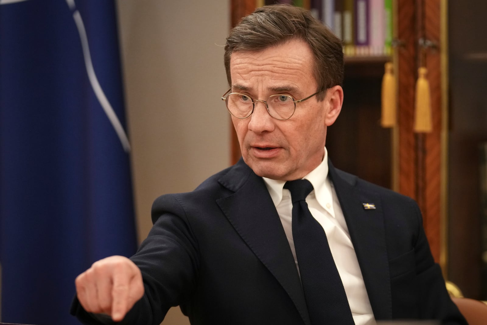 Sweden Prime Minister Ulf Kristersson speaks to the Associated Press during an interview at the Estonian Knighthood House in Tallinn, Estonia, on Dec. 17, 2024. (AP Photo/Sergei Grits)