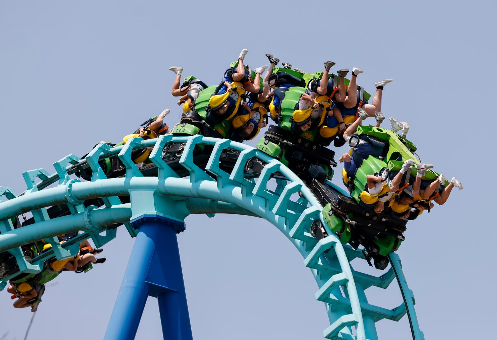 Kings Island visitors ride Invertigo roller coaster Friday, June 9, 2023 in Mason. NICK GRAHAM/STAFF