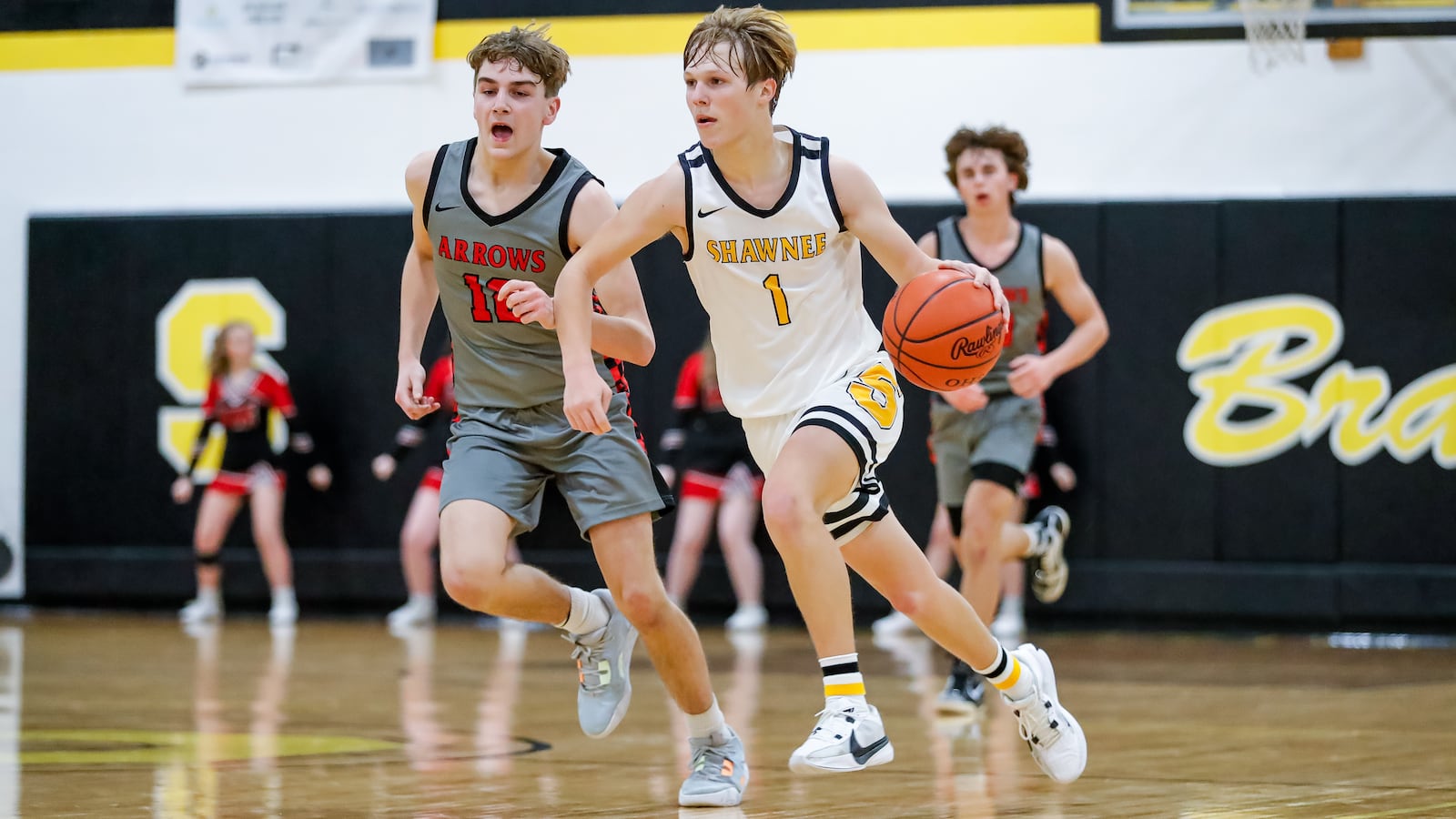 Shawnee High School junior Connar Earles dribbles past Tecumseh sophomore Austin Clark during their game on Tuesday, Dec. 12 in Springfield. Michael Cooper/CONTRIBUTED