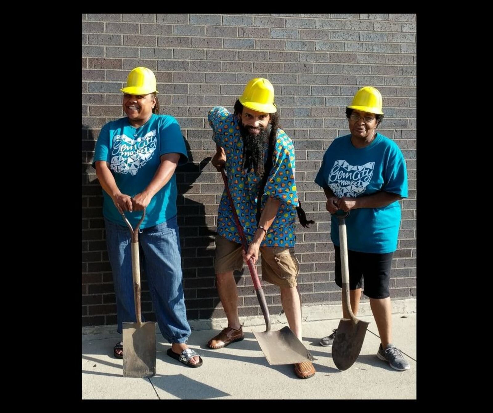 A groundbreaking ceremony is planned for the Gem City Market.  Left to right: Kenya Baker, Gem City Market Community Engagement Director; Amaha Sellassie, Gem City Market Board President; Corinne Sanders, Gem City Market Community Engagement Coordinator