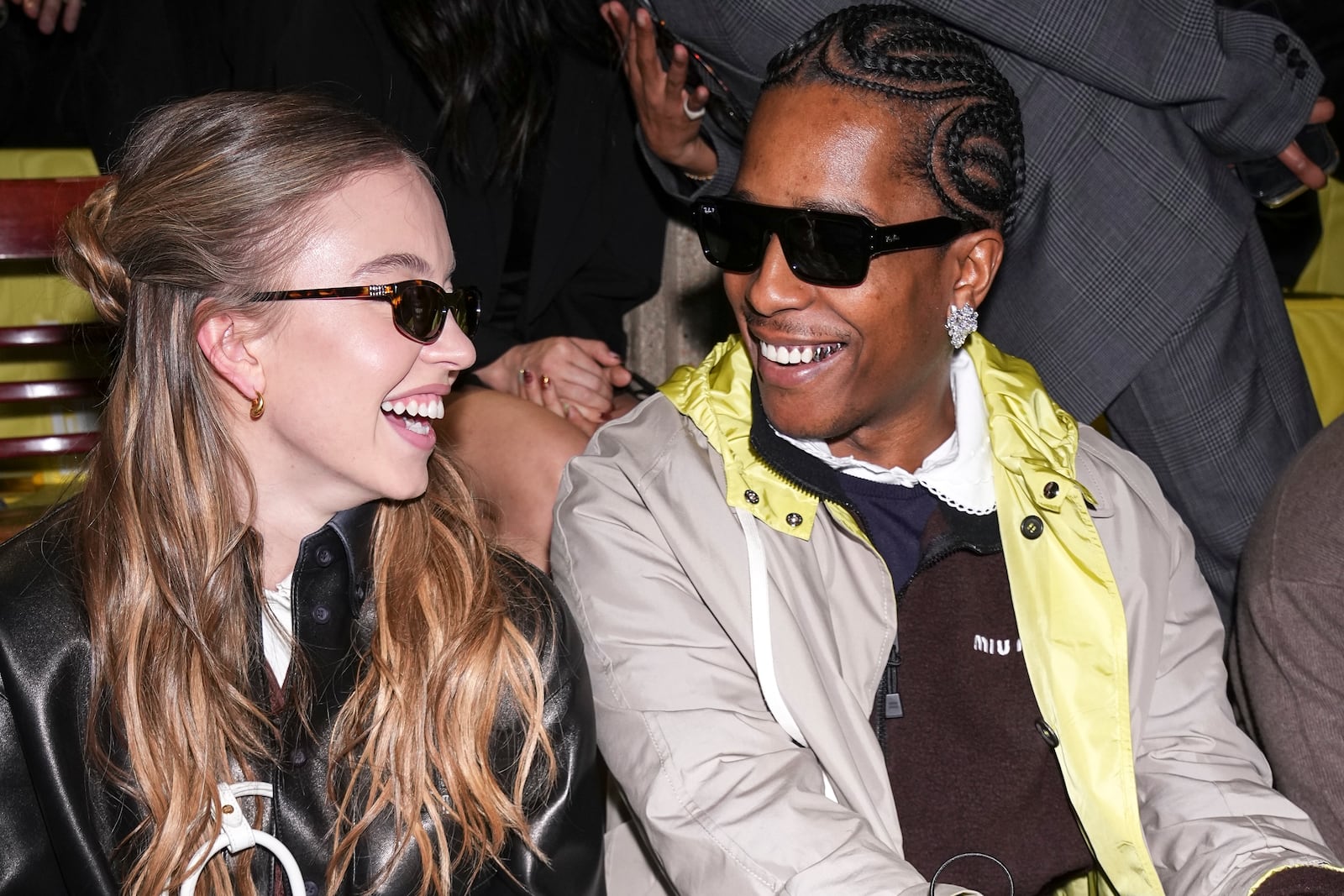 Sydney Sweeney, left, and A$AP Rocky attend the Miu Miu Fall/Winter 2025-2026 Womenswear collection presented Tuesday, March 11, 2025. in Paris. (Photo by Scott A Garfitt/Invision/AP)