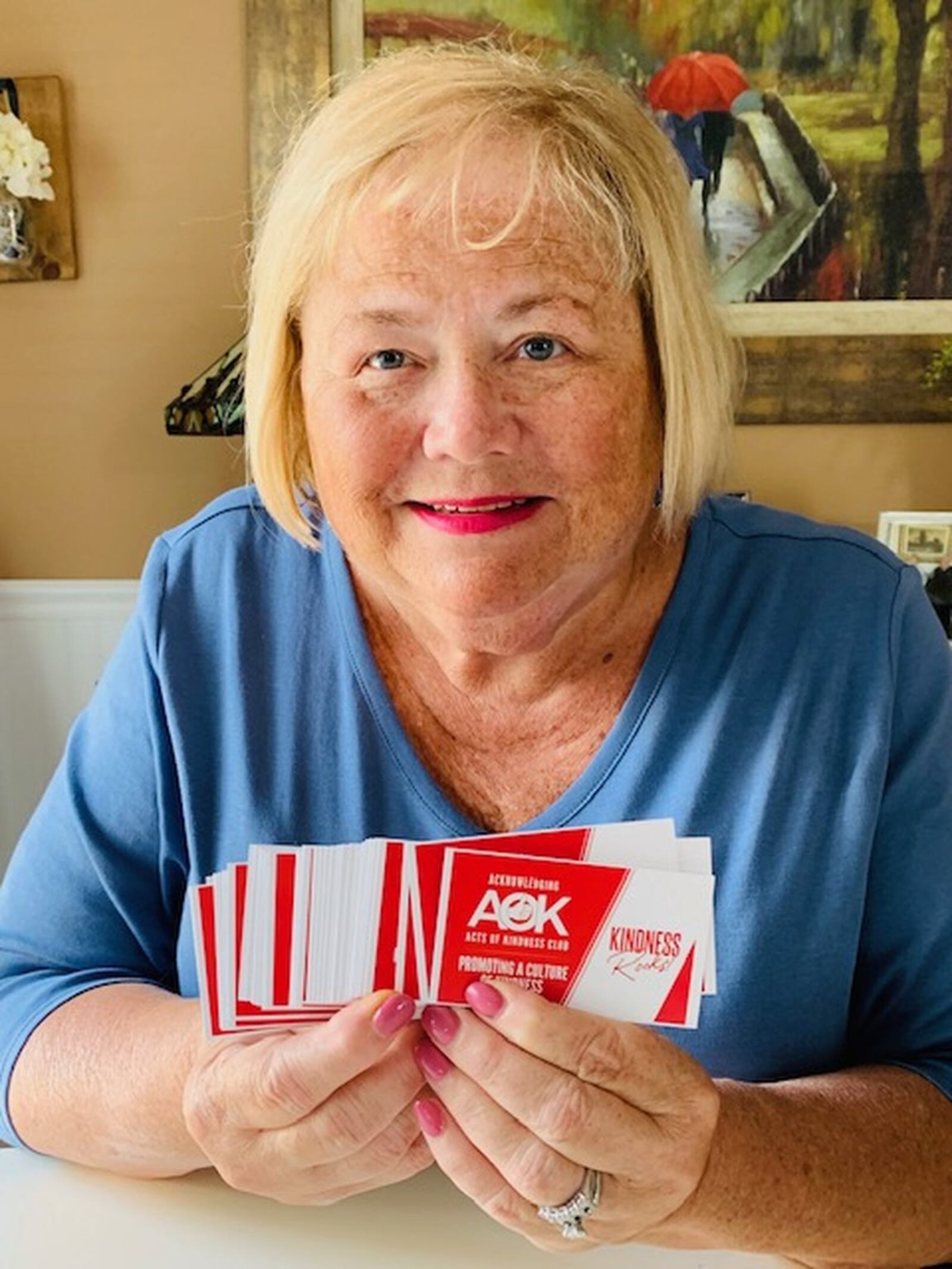 Anne Sheehan with free cards that acknowledge acts of kindness. CONTRIBUTED