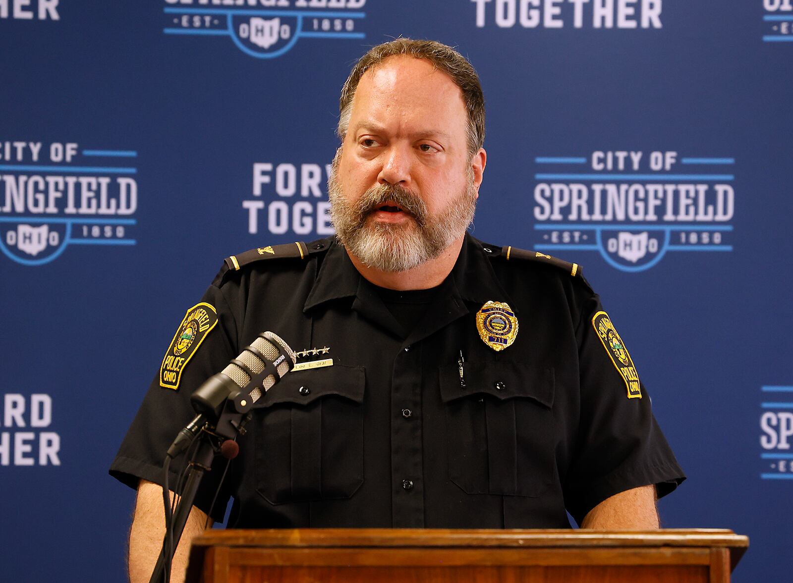 Springfield Police Chief Lee Graf answers questions regarding the death of Eric Cole during a press conference in June. Cole was shot and a police officer ran over him while responding to the scene. BILL LACKEY/STAFF