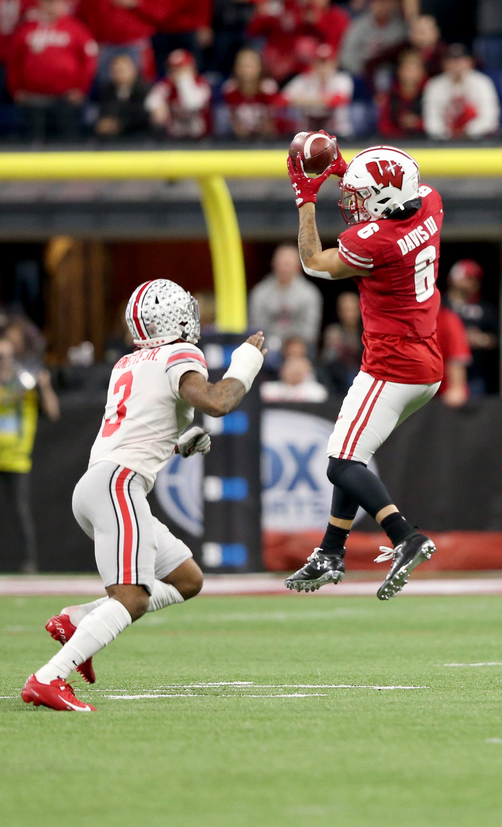 INDIANAPOLIS, INDIANA - DECEMBER 07: Danny Davis III #06 of the Wisconsin Badgers catches a pass in the Big Ten Championship game against the Ohio State Buckeyes at Lucas Oil Stadium on December 07, 2019 in Indianapolis, Indiana. (Photo by Justin Casterline/Getty Images)