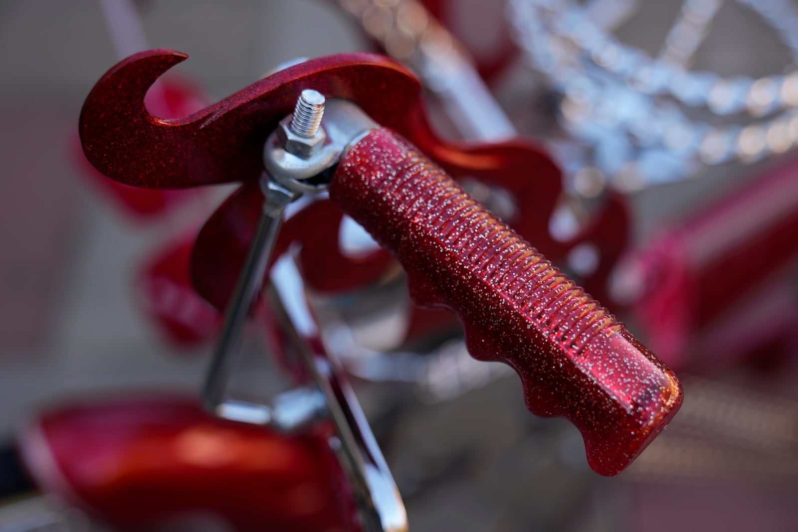 A detail of the lowrider bike custom-built by Luis Martinez, 29, a member of the Uso Chicago Car Club, can be seen Saturday, Sept. 21, 2024, in Mishawaka, Ind. (AP Photo/Erin Hooley)