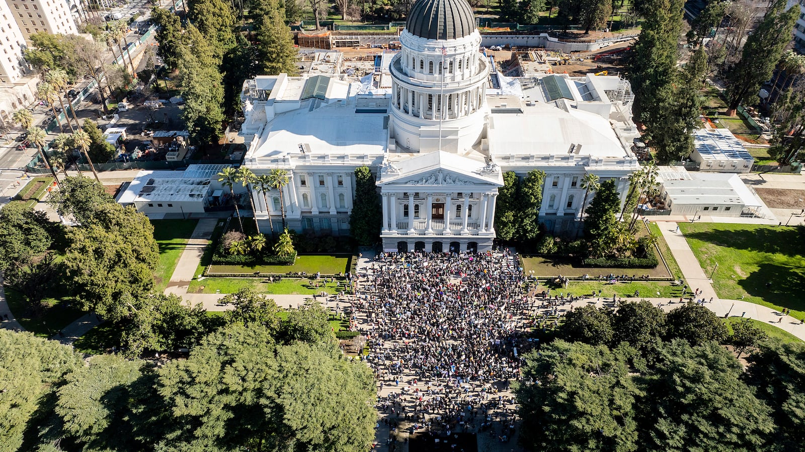 Several hundred demonstrators rally against President Donald Trump outside the California State Capitol on Wednesday, Feb. 5, 2025, in Sacramento, Calif. (AP Photo/Noah Berger)