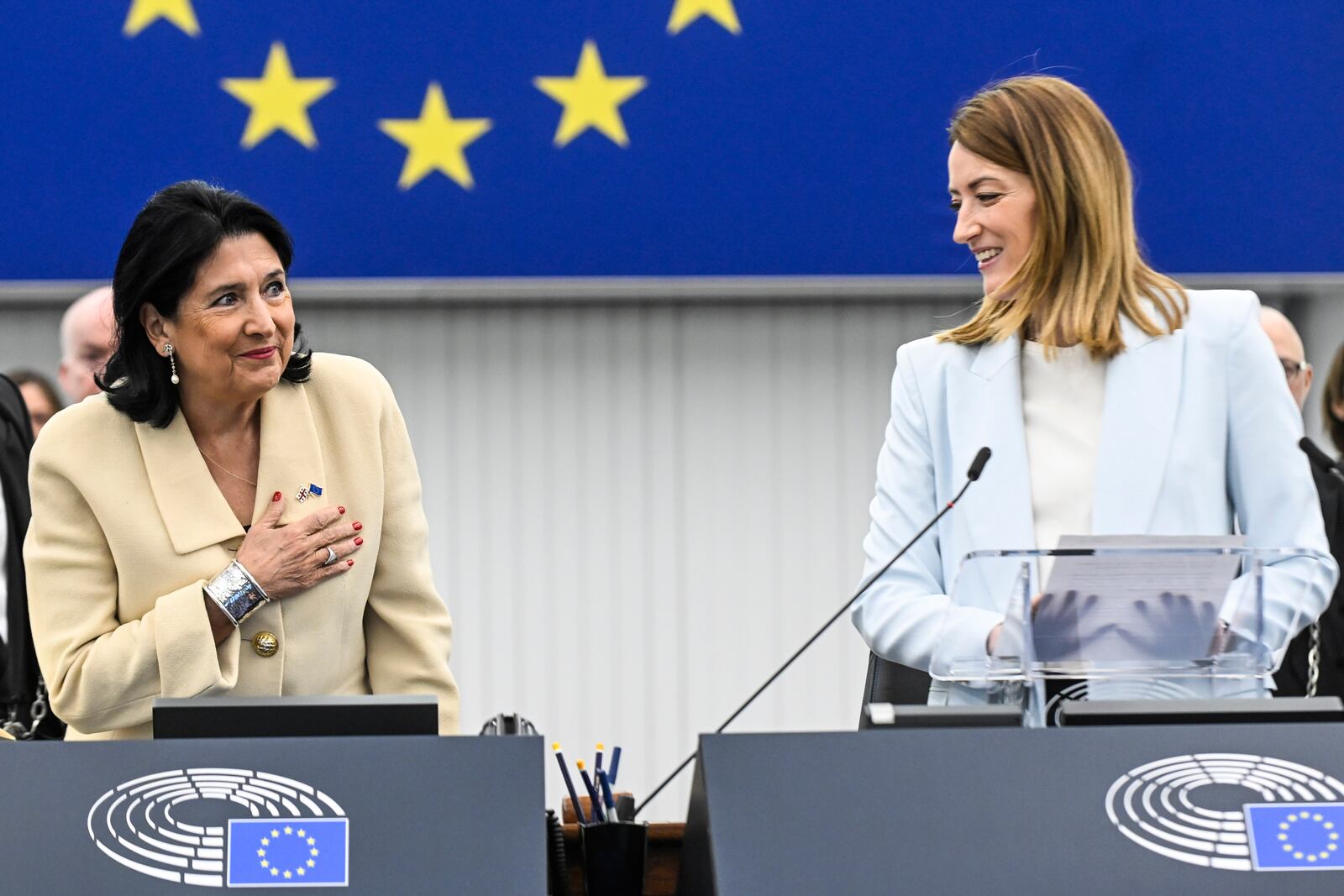 Georgian outgoing President Salome Zourabichvili , left, gestures as European Parliament president Roberta Metsola looks on, Wednesday, Dec. 18, 2024 in Strasbourg, eastern France. (AP Photo/Pascal Bastien)