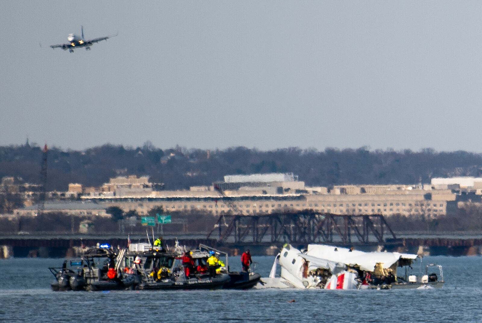 In this image provided by the U.S. Coast Guard, wreckage is seen in the Potomac River near Ronald Reagan Washington National Airport, Thursday, Jan. 30, 2025, in Washington. (Petty Officer 2nd Class Taylor Bacon, U.S. Coast Guard via AP)