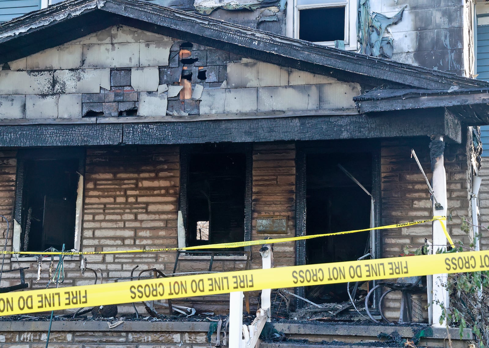 Two people were killed in a house fire early Saturday, Dec. 14, 2024 in the 1800 block of South Center Blvd. The Springfield Fire & Rescue Division arrived to find the front of the house fully engulfed in flames. As the firefighters tried to make entry into the house, one of the firefighters legs went through the floor so they had to attack the fire from the outside. BILL LACKEY/STAFF