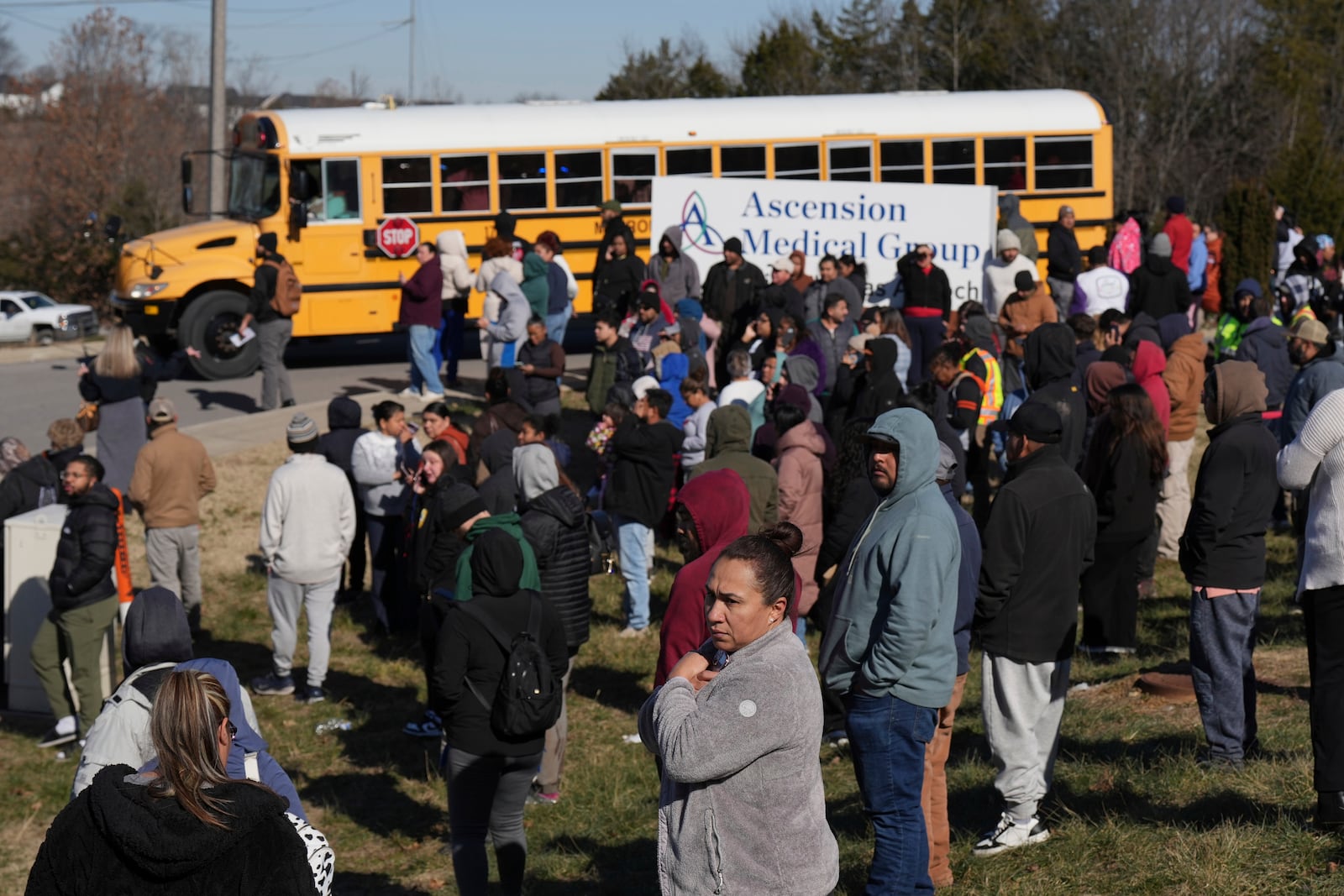 A school bus arrives at unification site following a shooting at the Antioch High School in Nashville, Tenn., Wednesday, Jan. 22, 2025. (AP Photo/George Walker IV)