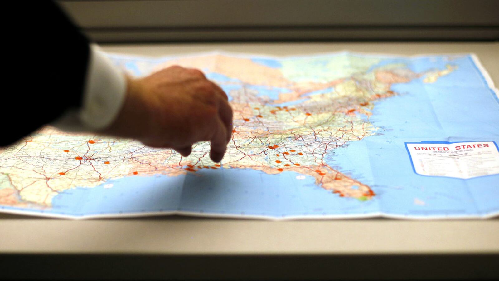 LAPD Detective Rick Jackson examines a map in March 2013 that is dotted with locations where Samuel Little had interactions with law enforcement over the years. Little, 79, has been named by the FBI as the most prolific serial killer in U.S. history.