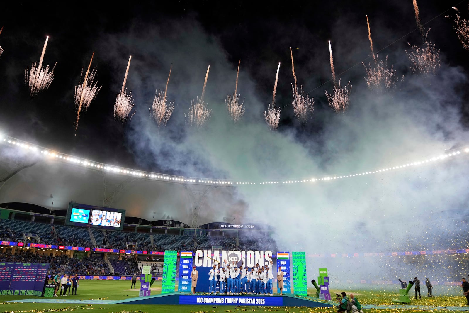 India's players celebrate after winning the ICC Champions Trophy final cricket match against New Zealand at Dubai International Cricket Stadium in Dubai, United Arab Emirates, Sunday, March 9, 2025. (AP Photo/Altaf Qadri)