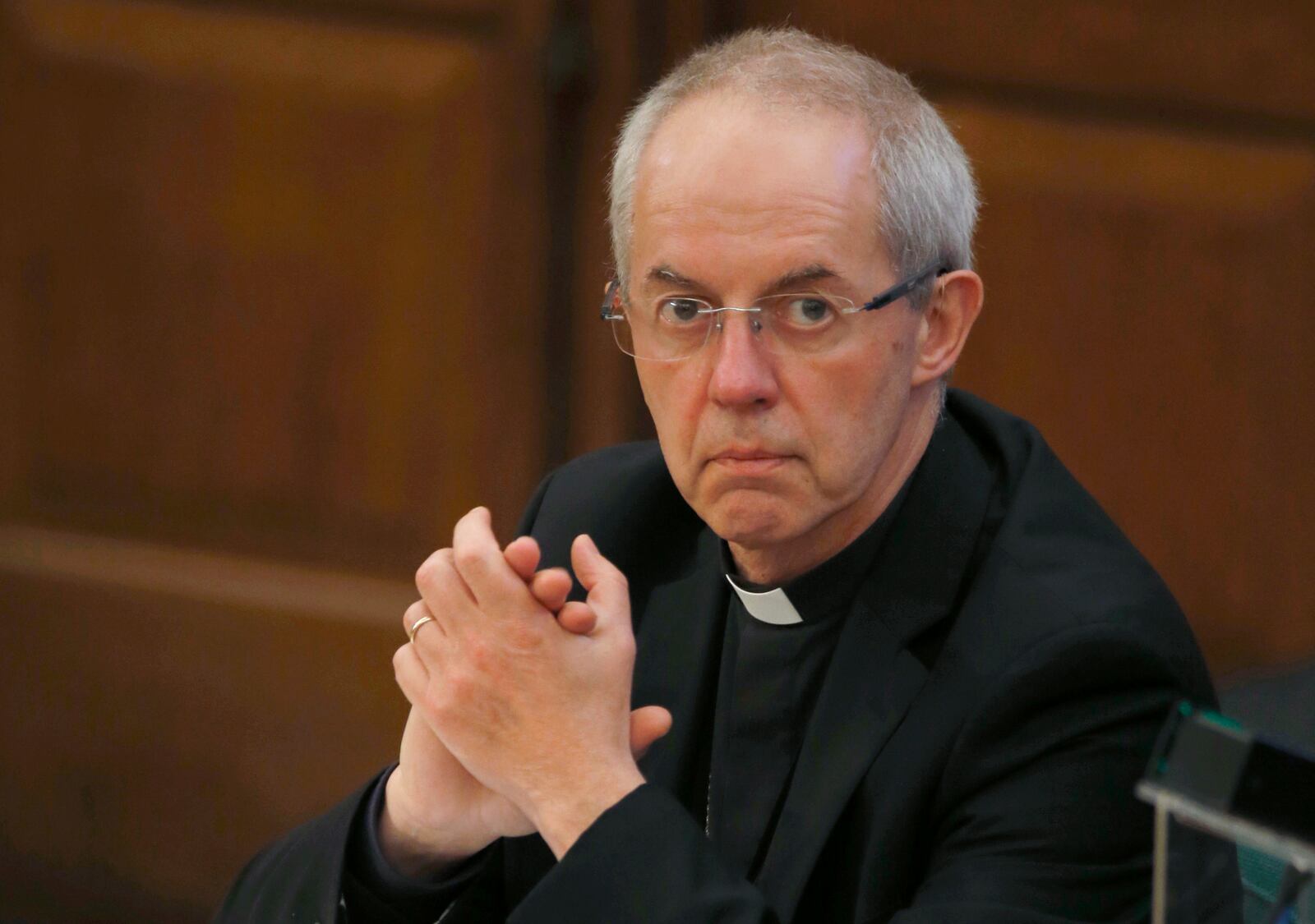 FILE - Archbishop of Canterbury Justin Welby as he listens to debate at the General Synod in London, Monday, Feb. 13, 2017. (AP Photo/Alastair Grant, File)