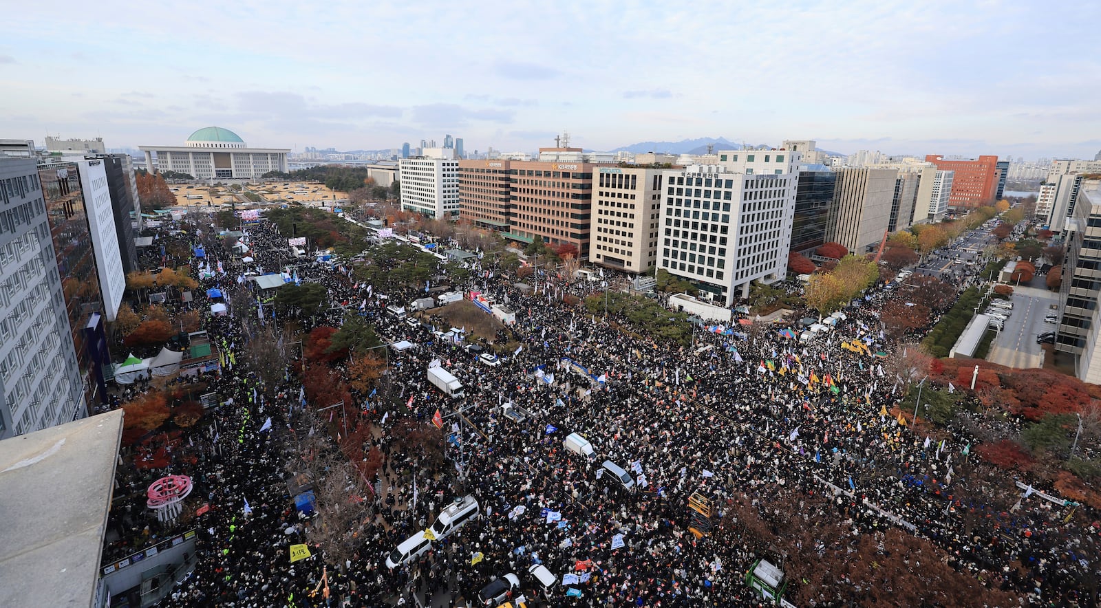 Protesters stage a rally demanding South Korean President Yoon Suk Yeol's impeachment following the president's short-lived martial law declaration in front of the National Assembly in Seoul, South Korea, Saturday, Dec. 7, 2024. (Seo Dae-yeon/Yonhap via AP)